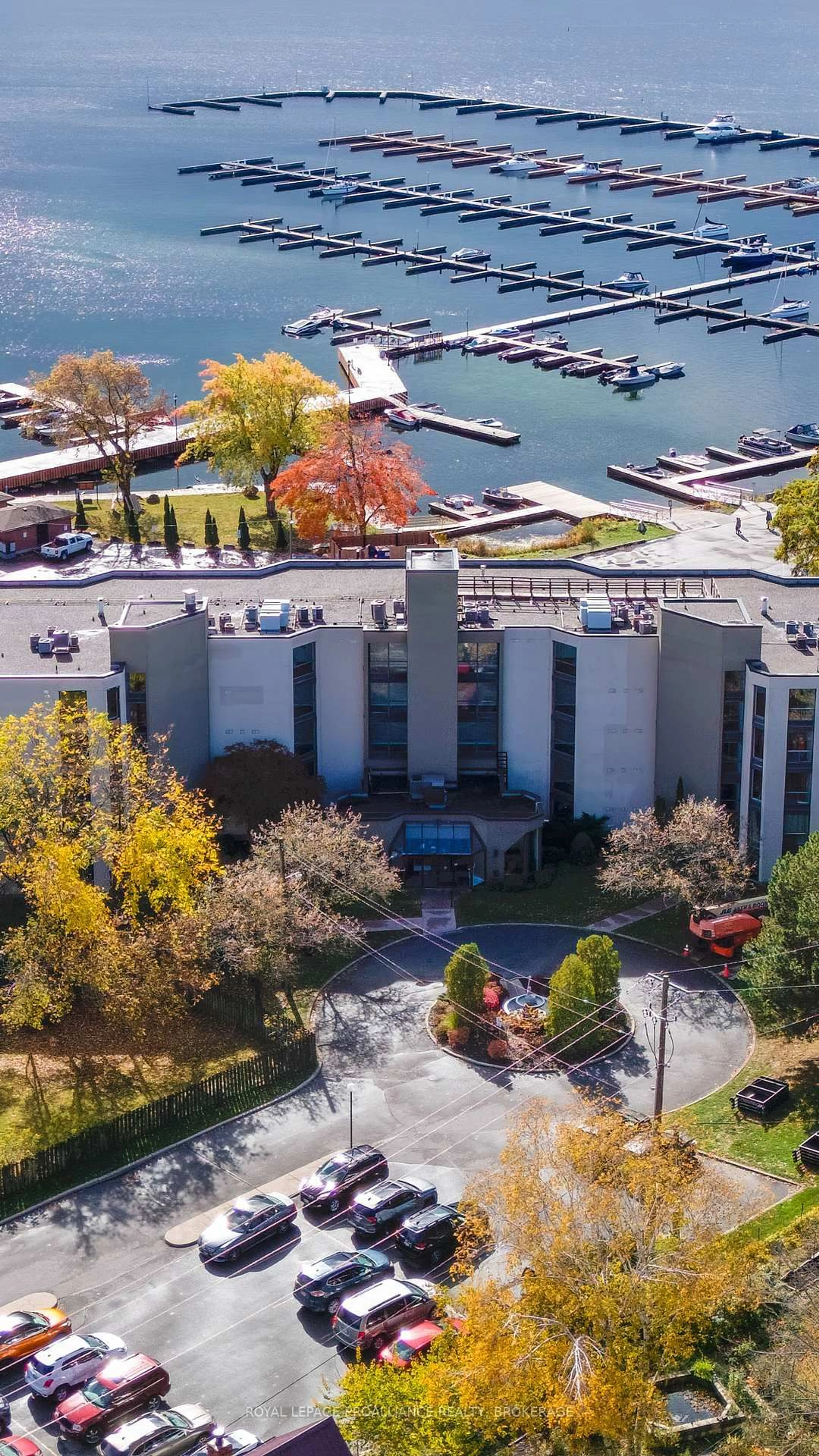 A pic from outside/outdoor area/front of a property/back of a property/a pic from drone, water/lake/river/ocean view for 50 Market St #302, Gananoque Ontario K7G 2M3