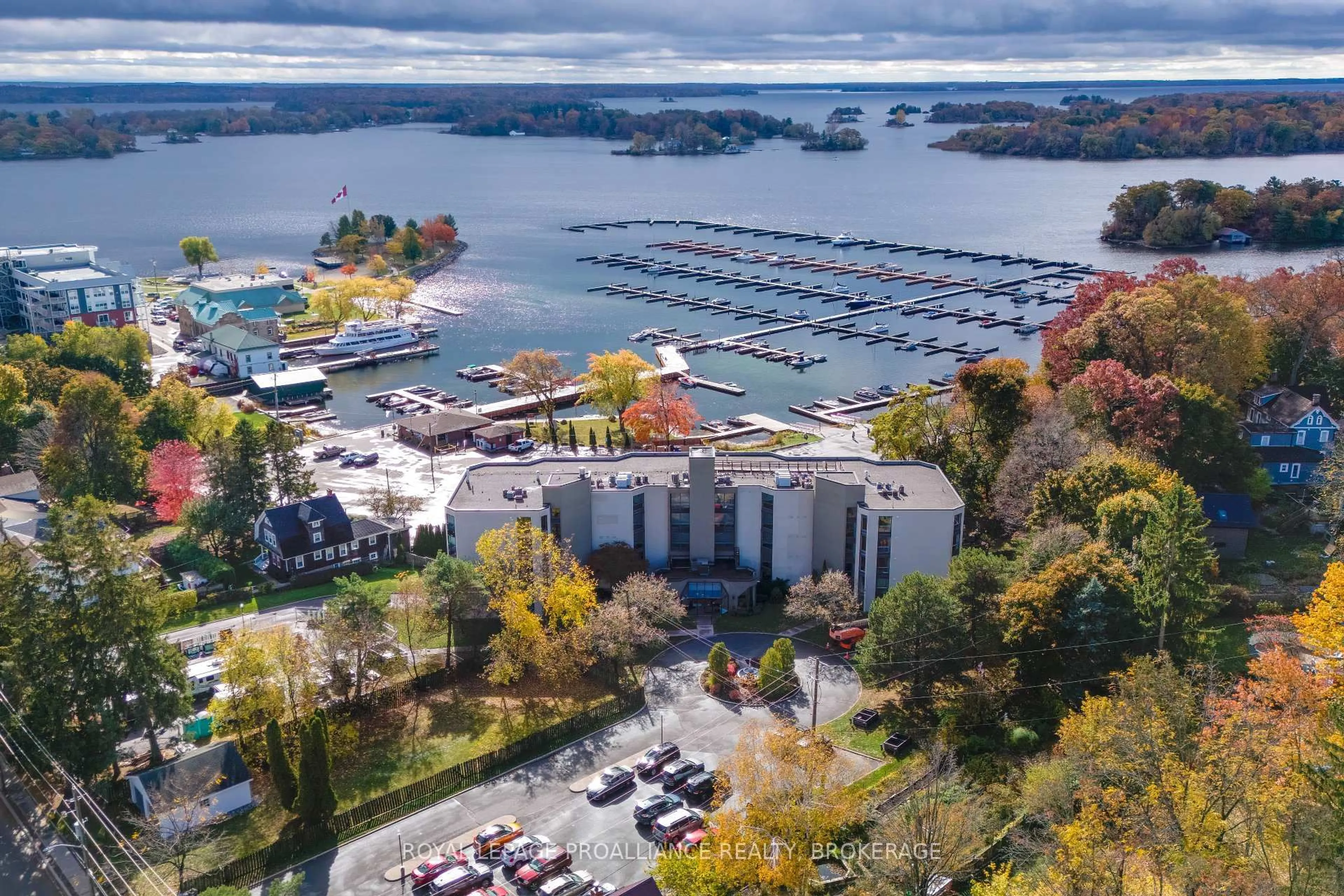 A pic from outside/outdoor area/front of a property/back of a property/a pic from drone, water/lake/river/ocean view for 50 Market St #302, Gananoque Ontario K7G 2M3