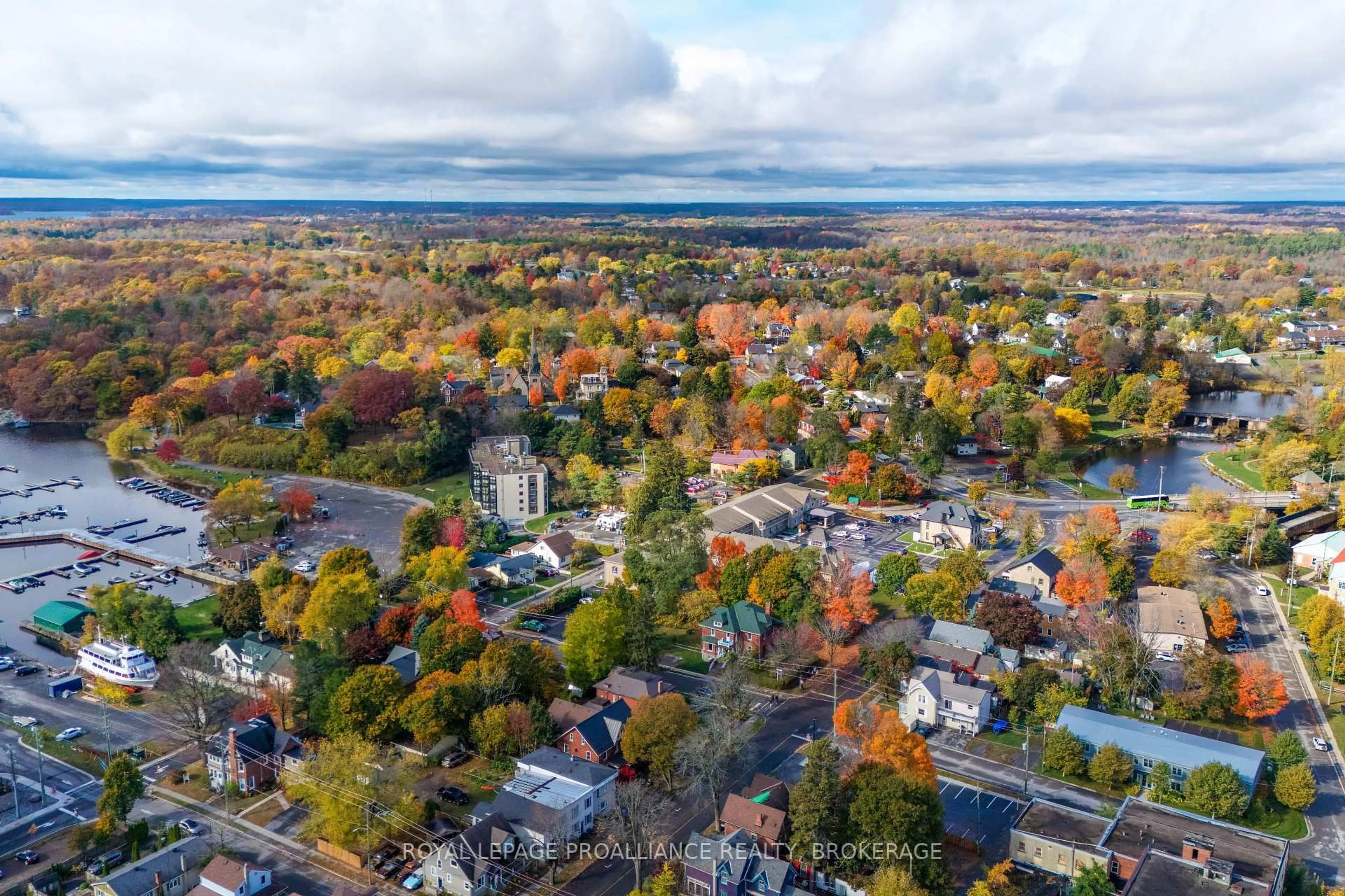 A pic from outside/outdoor area/front of a property/back of a property/a pic from drone, street for 50 Market St #302, Gananoque Ontario K7G 2M3
