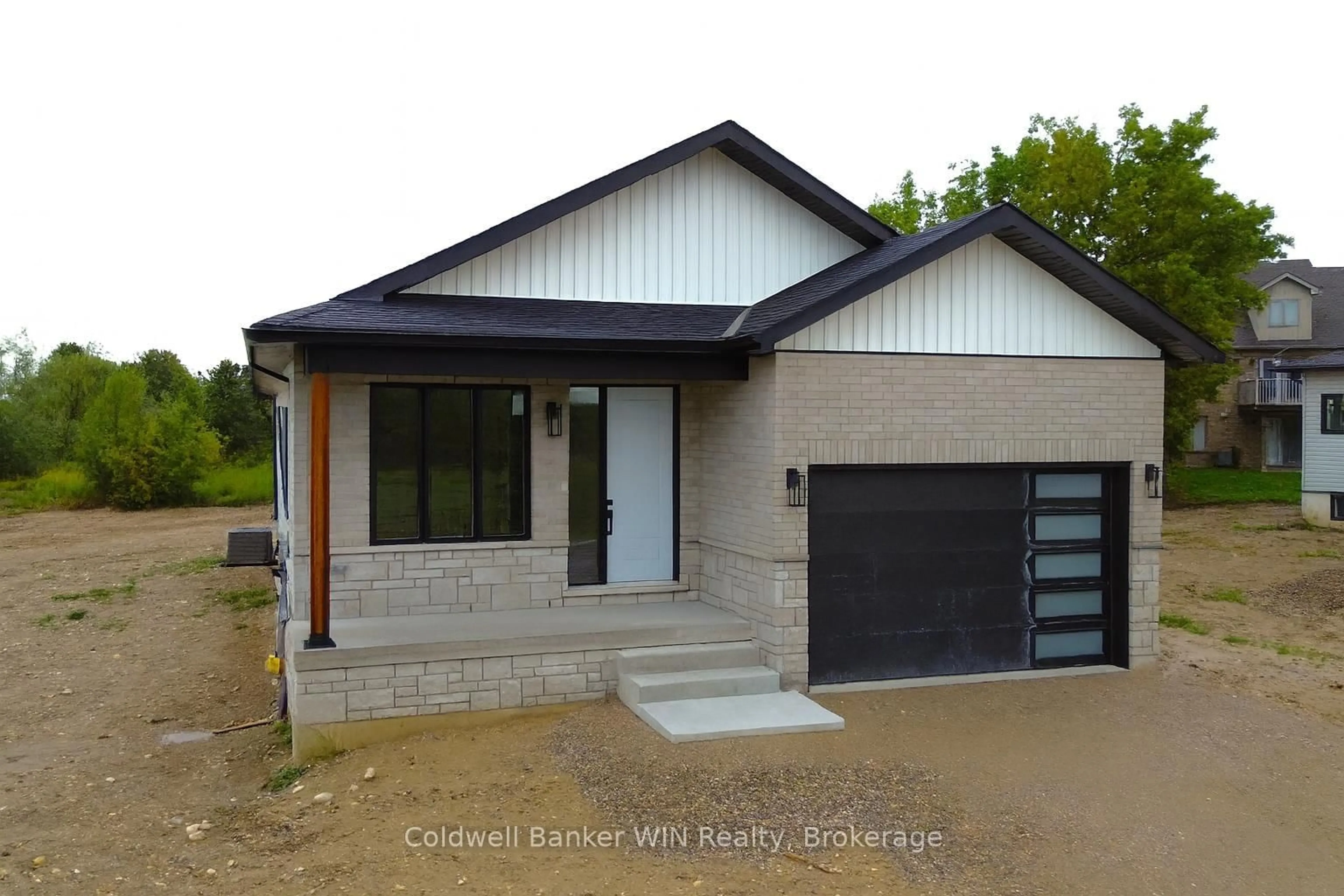 Home with brick exterior material, street for 647 Martin St, Wellington North Ontario N0G 2L3
