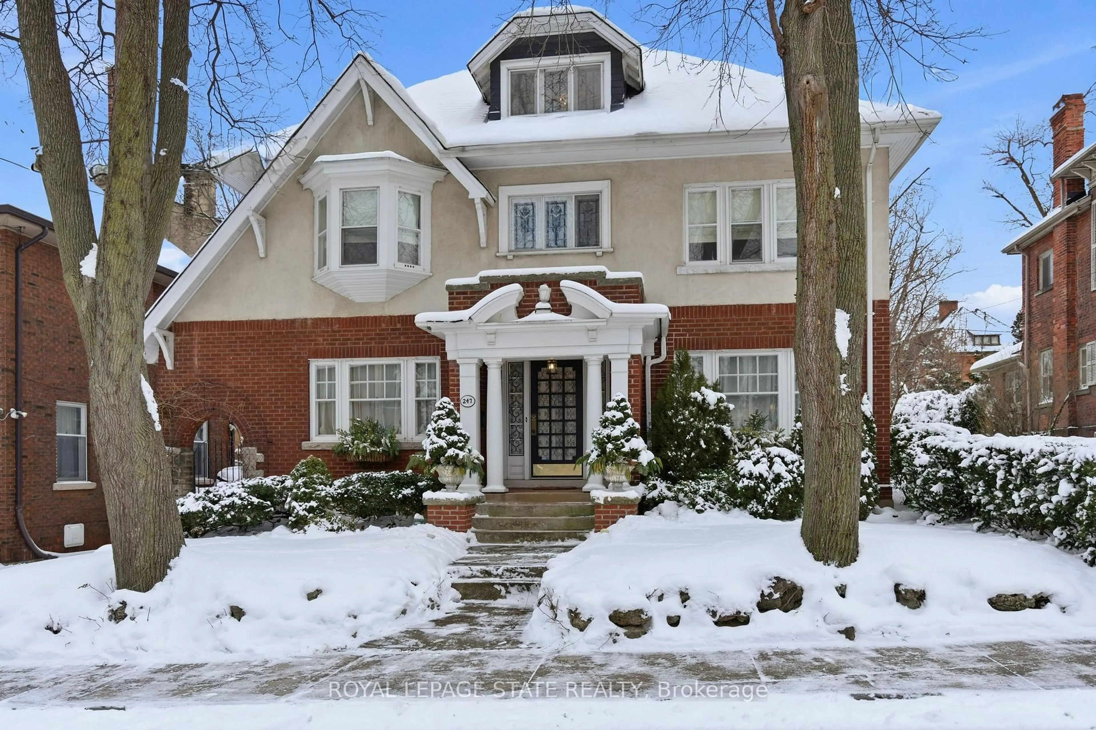 Home with brick exterior material, street for 247 MacNab St, Hamilton Ontario L8P 3E2