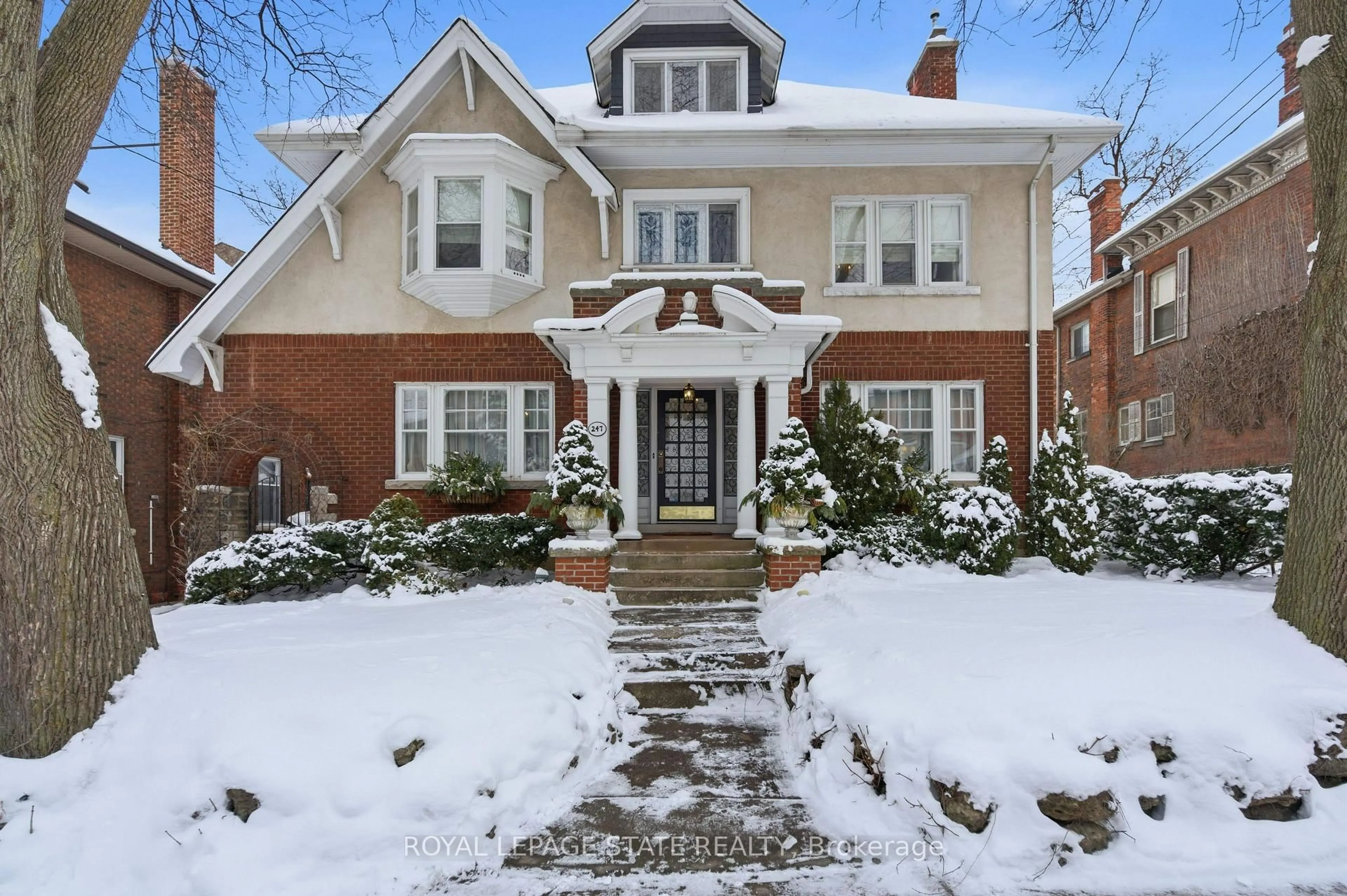 Home with brick exterior material, street for 247 MacNab St, Hamilton Ontario L8P 3E2