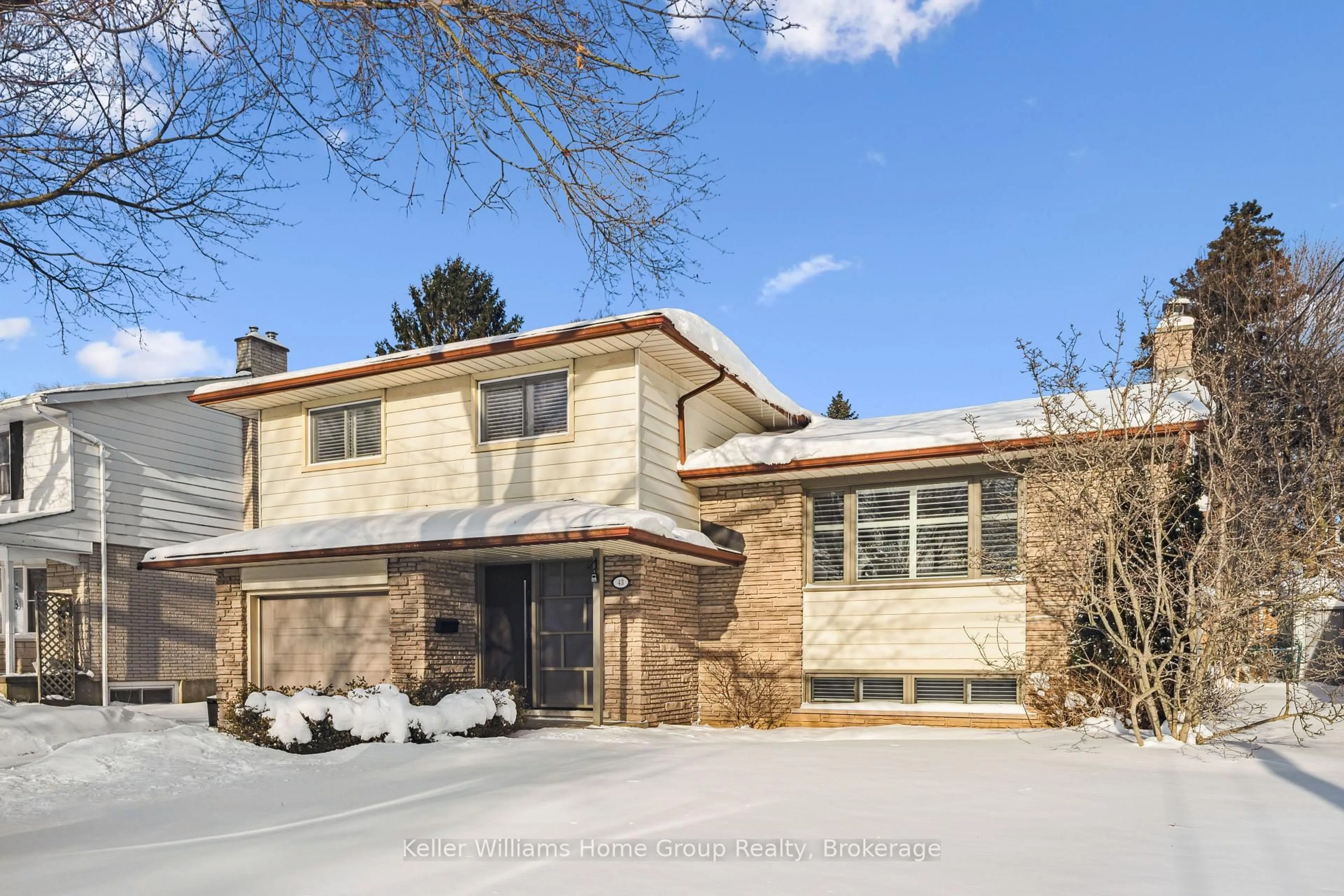 Home with brick exterior material, street for 43 Glenburnie Dr, Guelph Ontario N1E 4C5