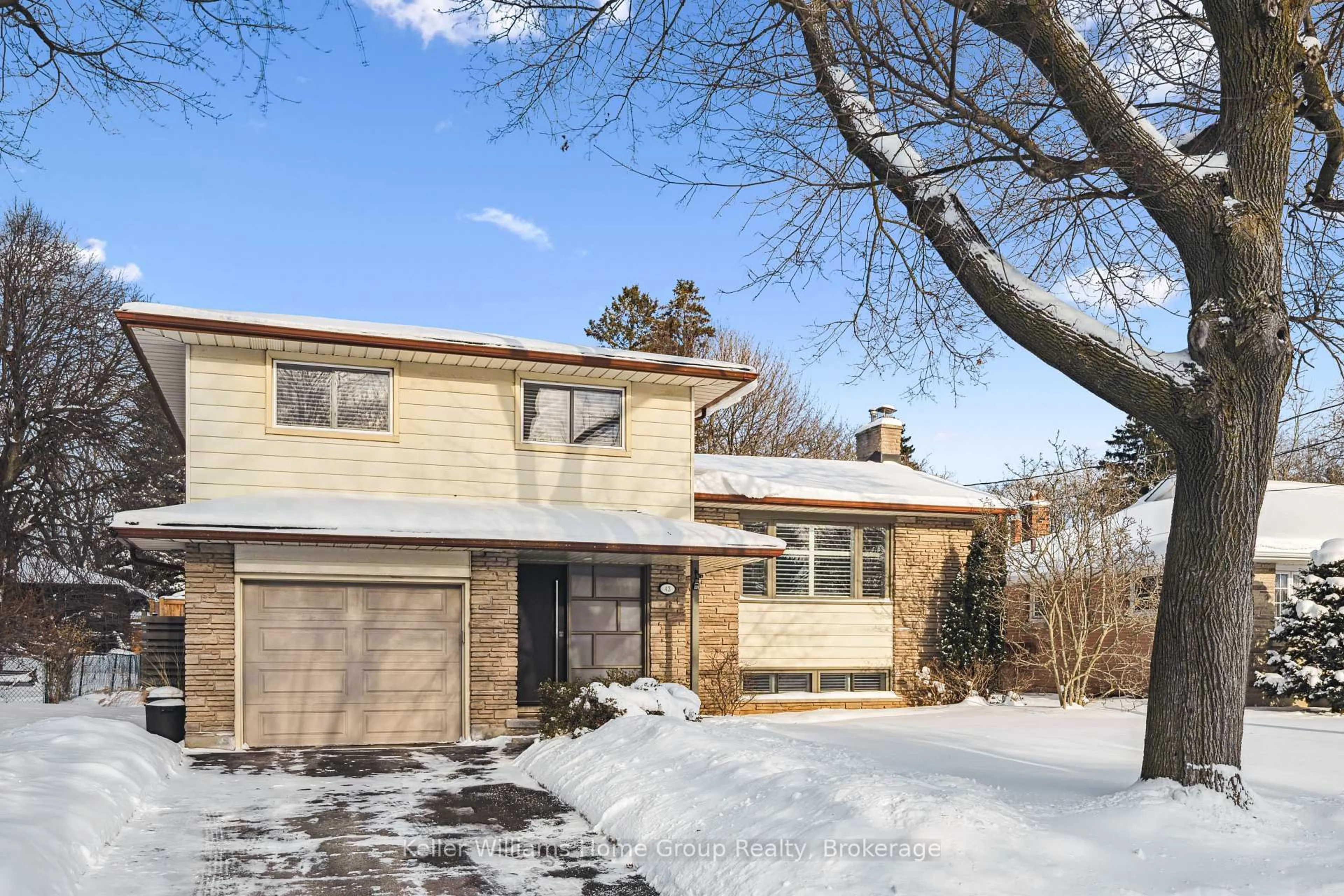 Home with brick exterior material, street for 43 Glenburnie Dr, Guelph Ontario N1E 4C5