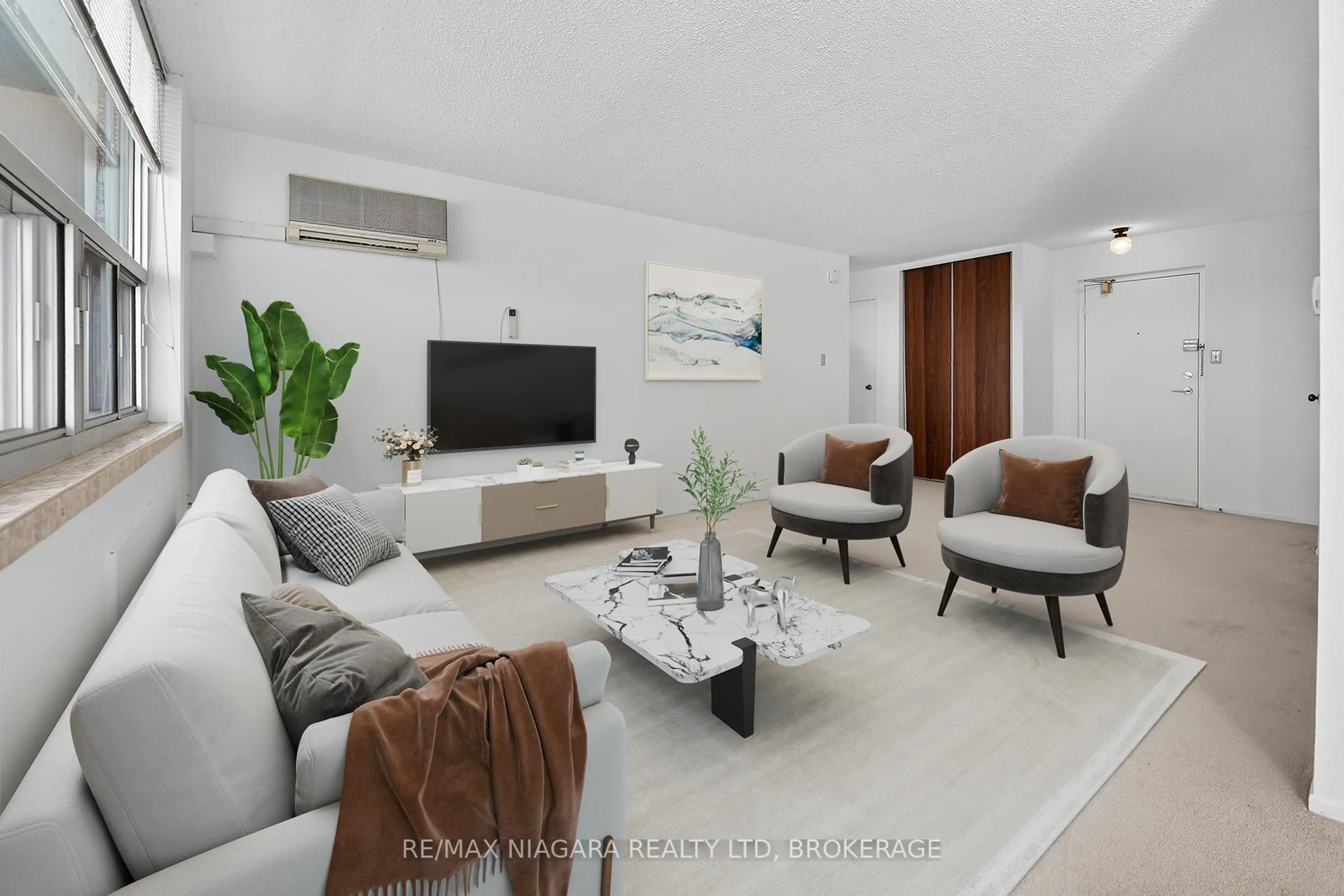 Living room with furniture, unknown for 365 Geneva St #1003, St. Catharines Ontario L2N 5S7