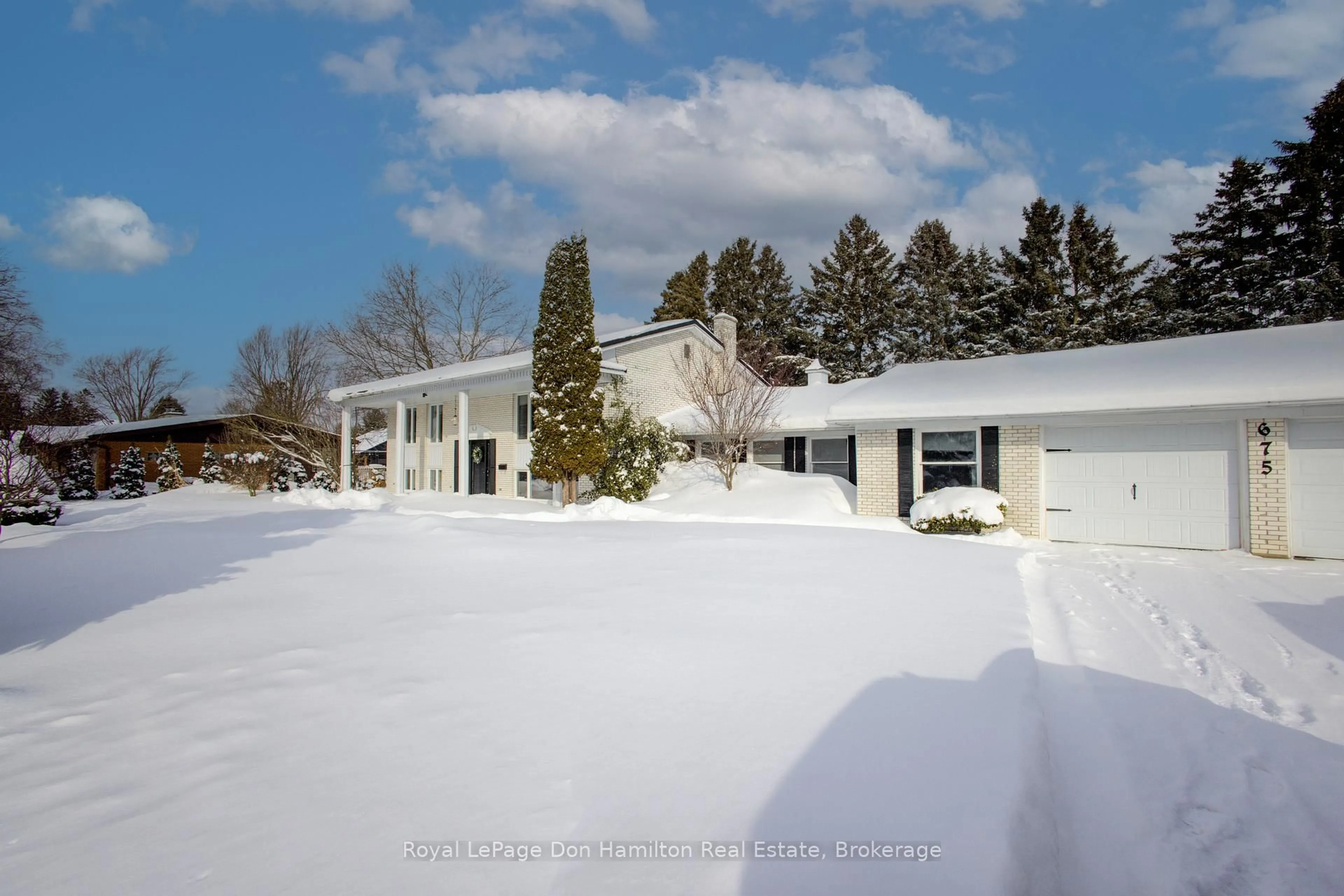A pic from outside/outdoor area/front of a property/back of a property/a pic from drone, street for 675 Prospect St, Minto Ontario N0G 2P0