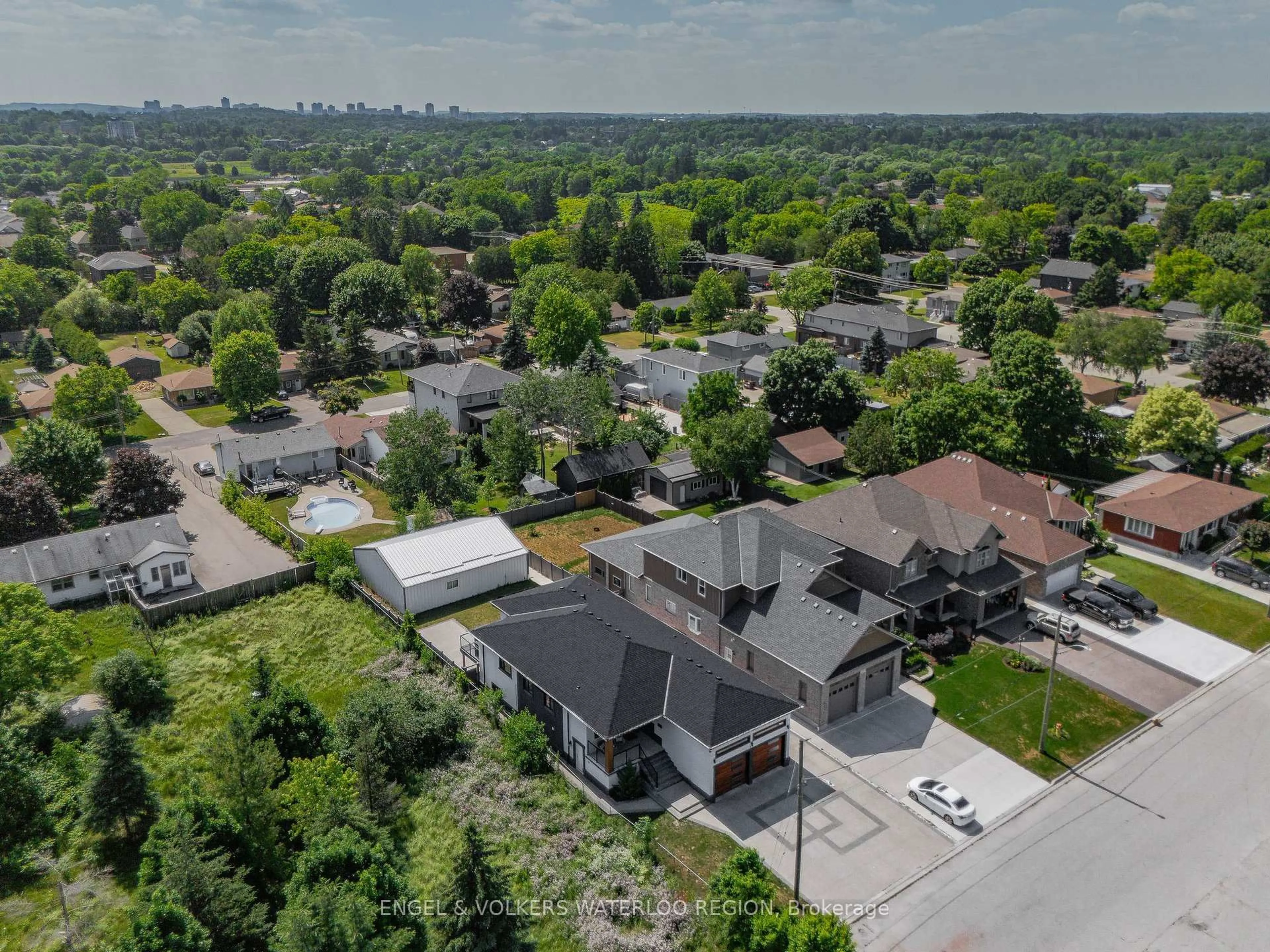 A pic from outside/outdoor area/front of a property/back of a property/a pic from drone, city buildings view from balcony for 24 Sylvia St, Kitchener Ontario N2K 1E7