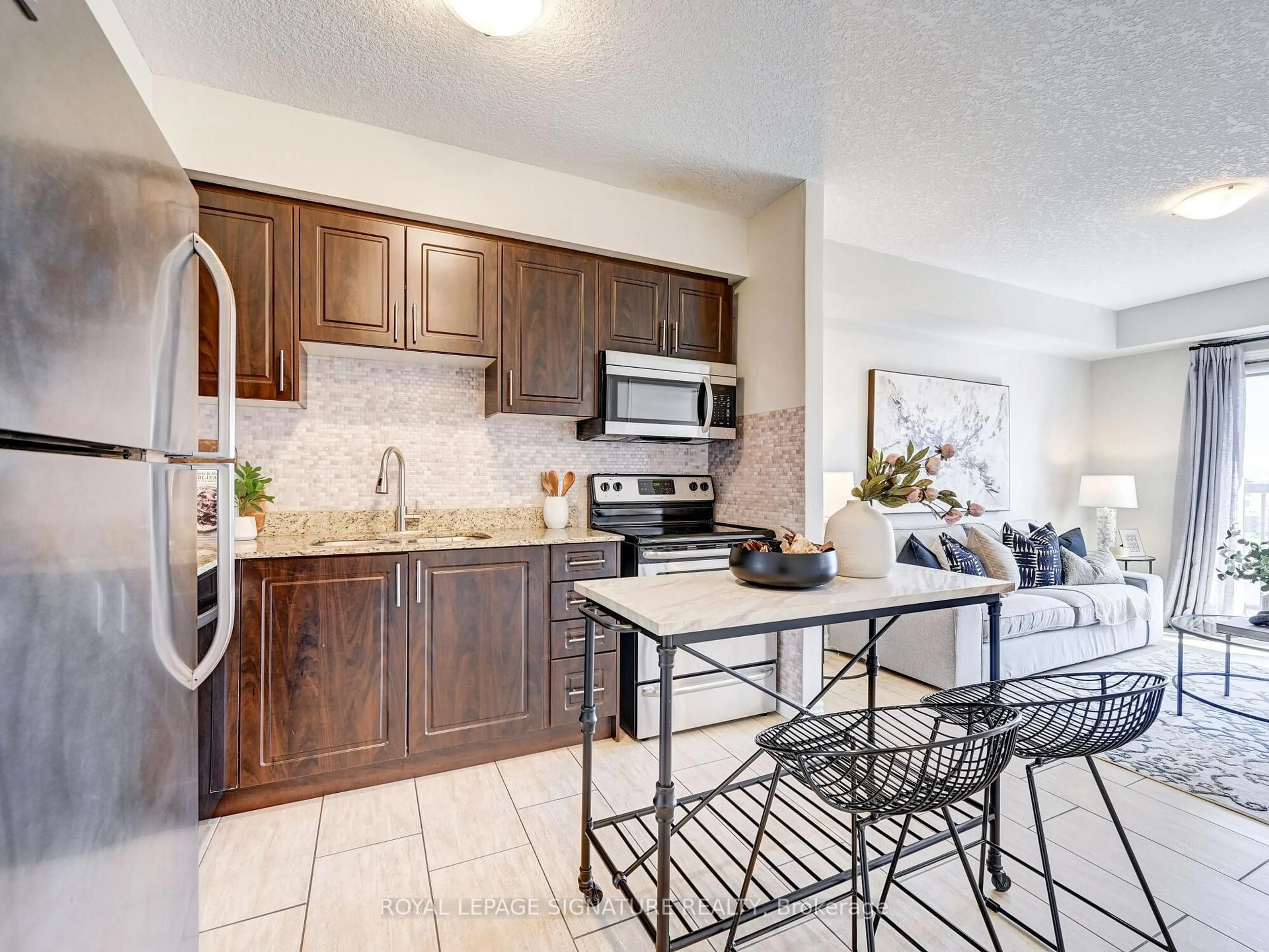 Open concept kitchen, ceramic/tile floor for 886 Golf Links Rd #205, Hamilton Ontario L9K 1J8