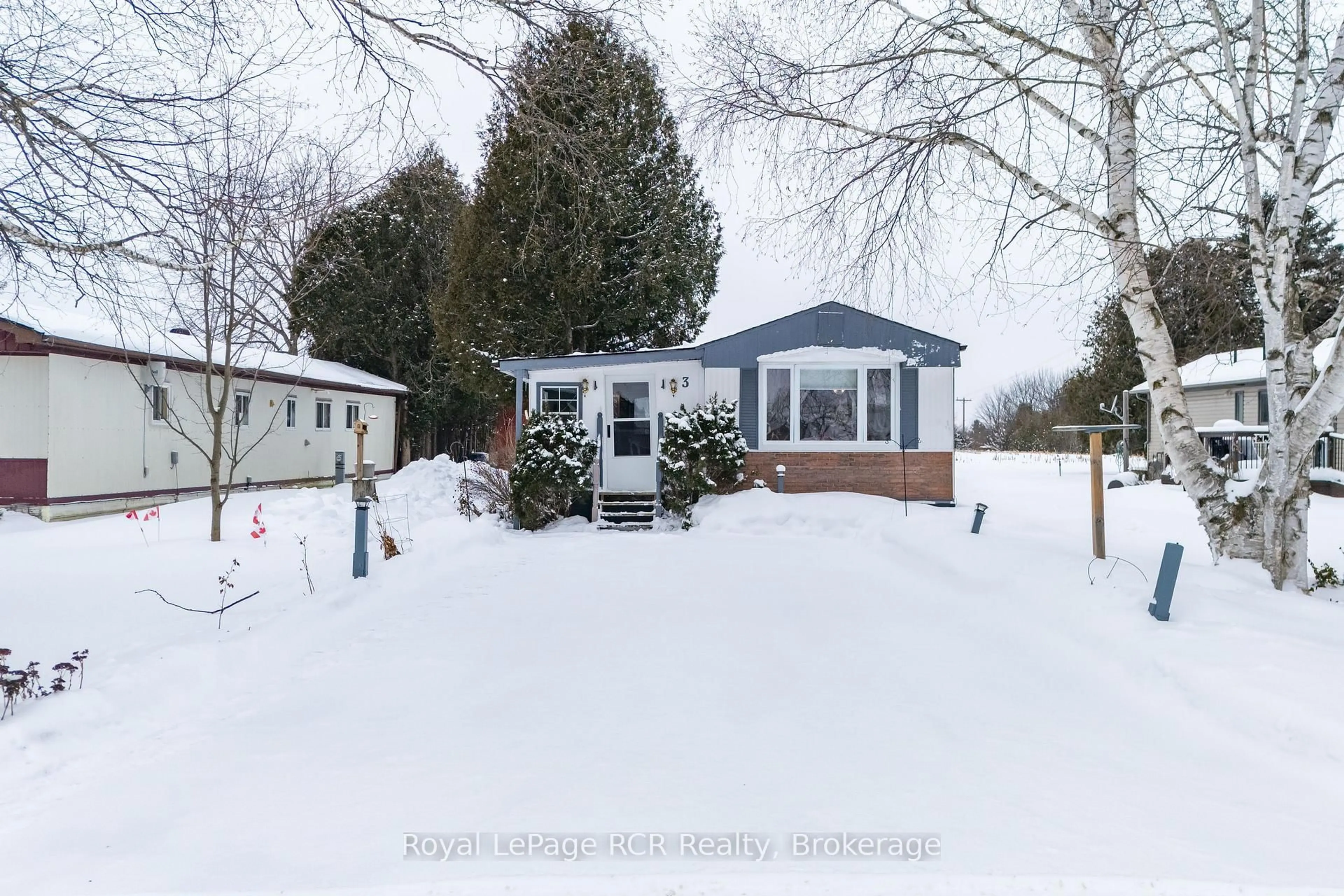 A pic from outside/outdoor area/front of a property/back of a property/a pic from drone, street for 302694 Douglas St #Unit #3, West Grey Ontario N0G 1R0