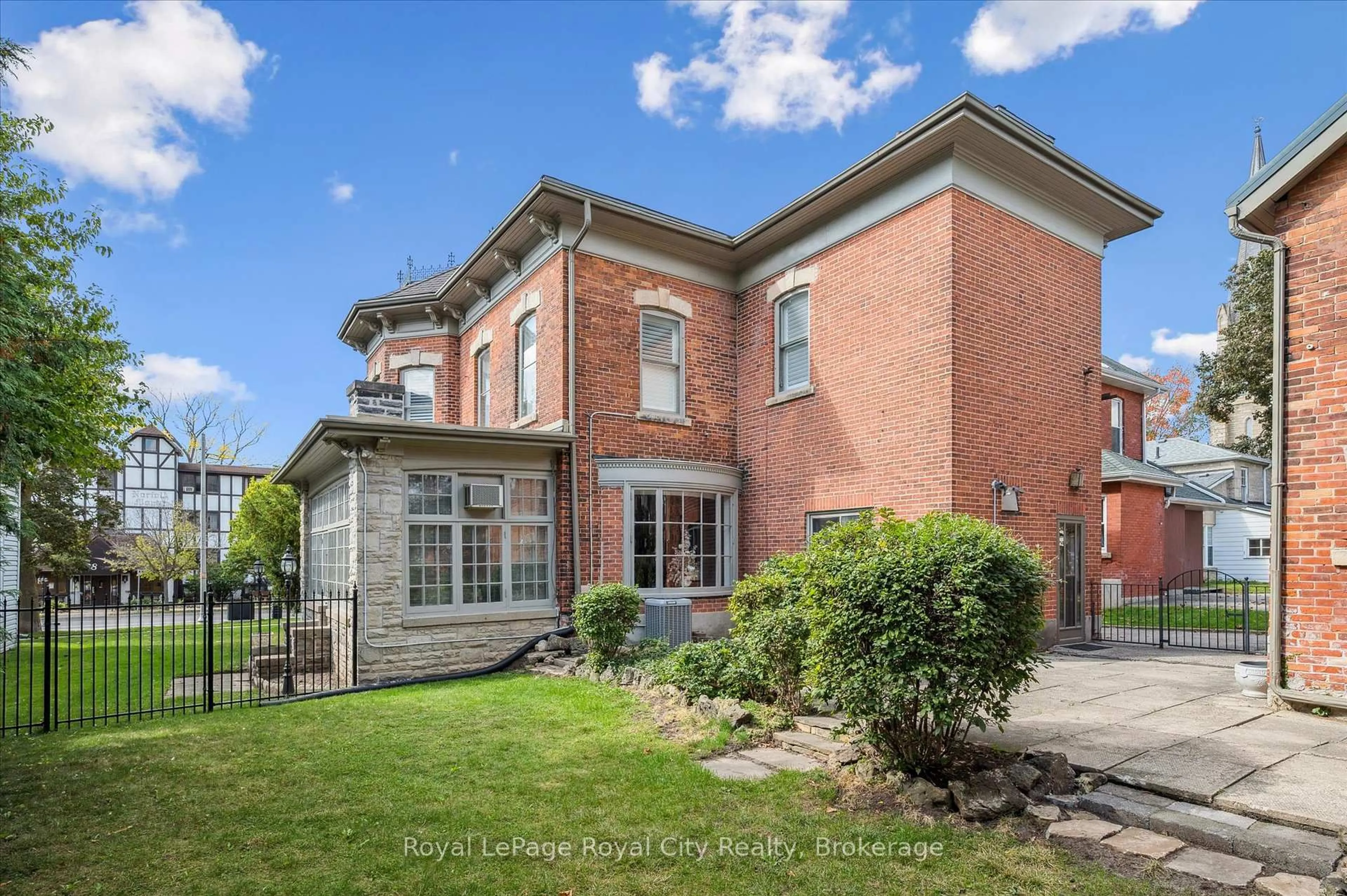 Home with brick exterior material, building for 143 Norfolk St, Guelph Ontario N1H 4J7