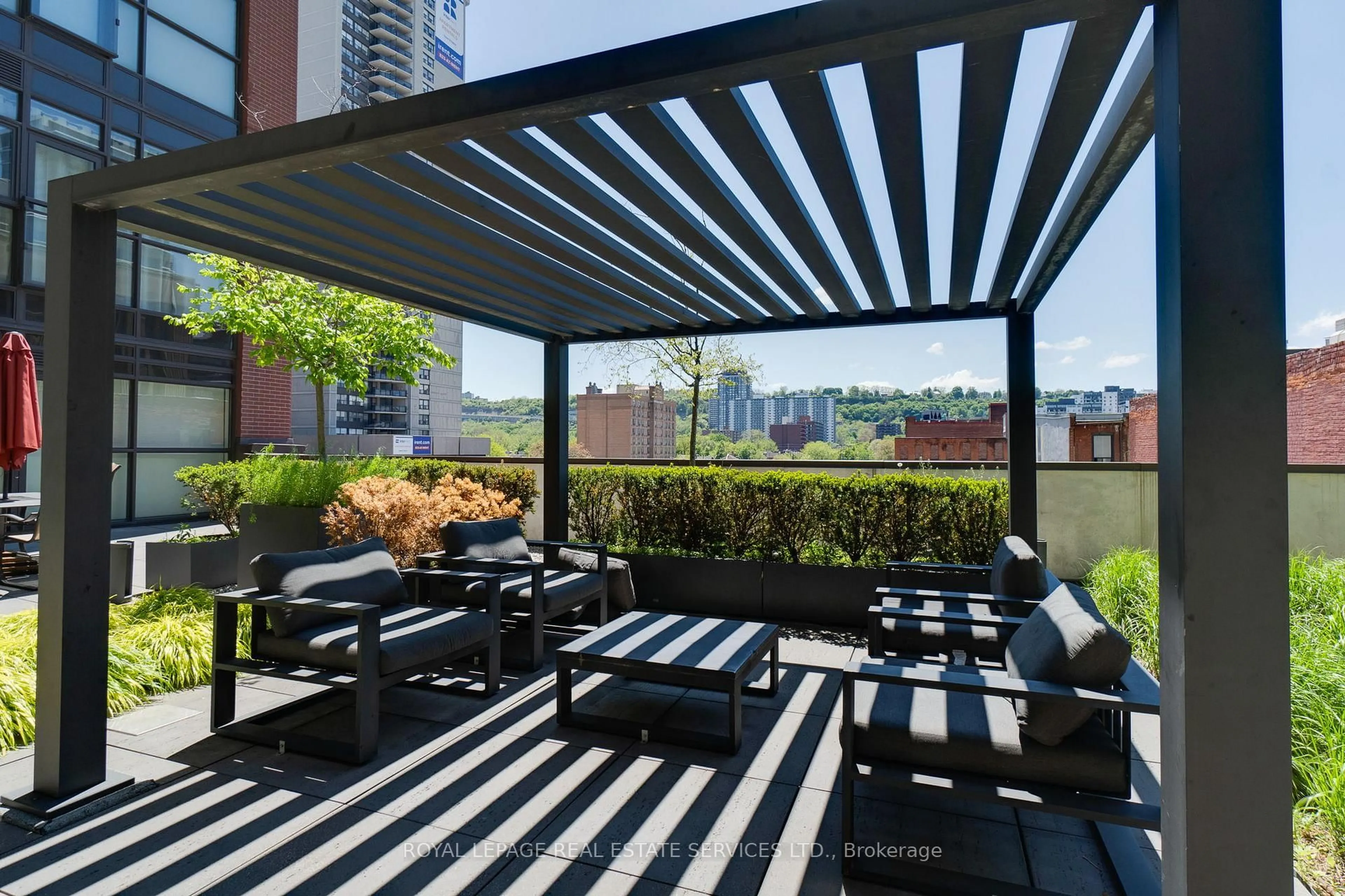 Patio, city buildings view from balcony for 112 King St #Unit 611, Hamilton Ontario L9G 3V8