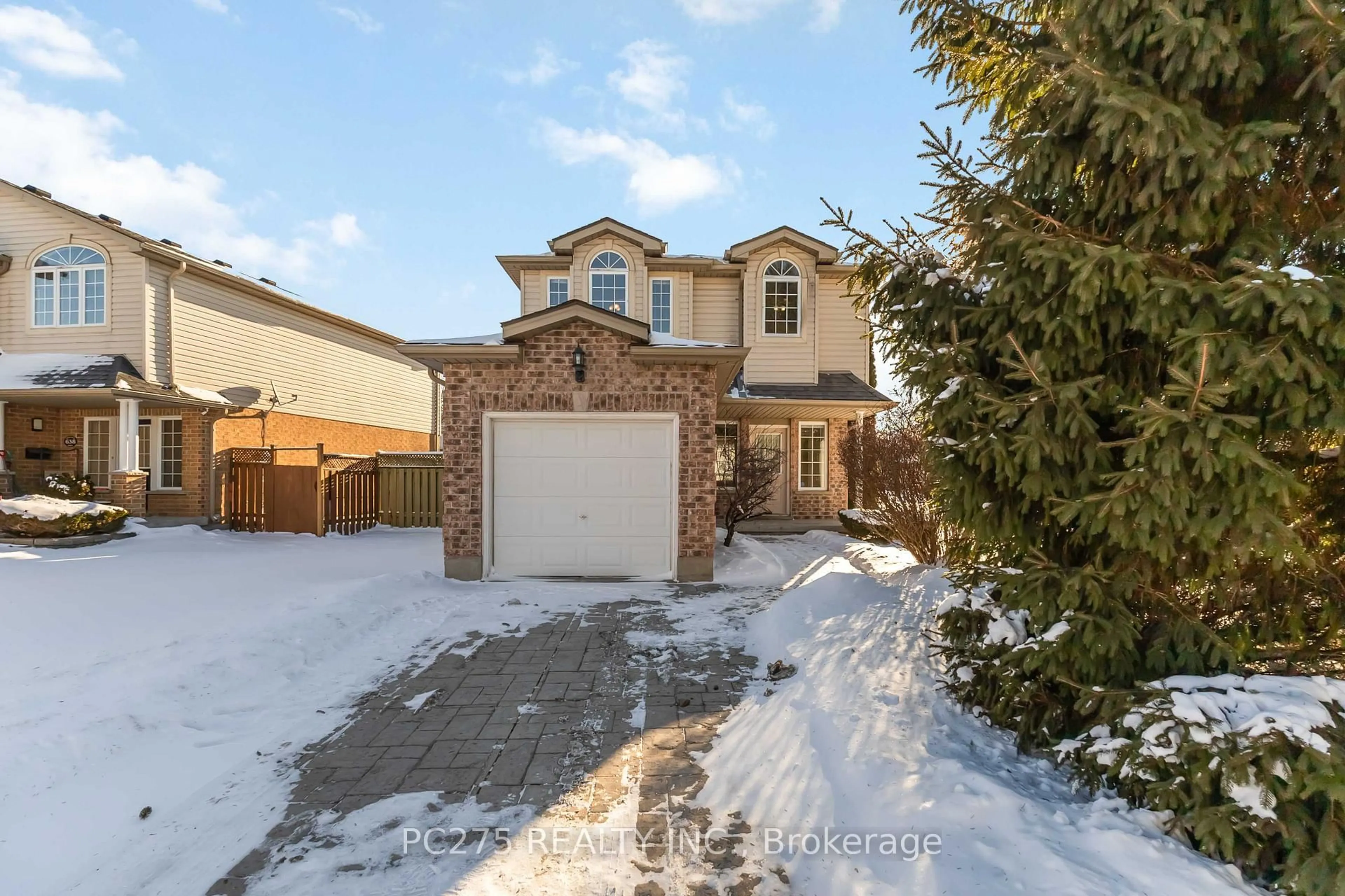Home with brick exterior material, street for 634 Ridgeview Dr, London East Ontario N5Y 5T8