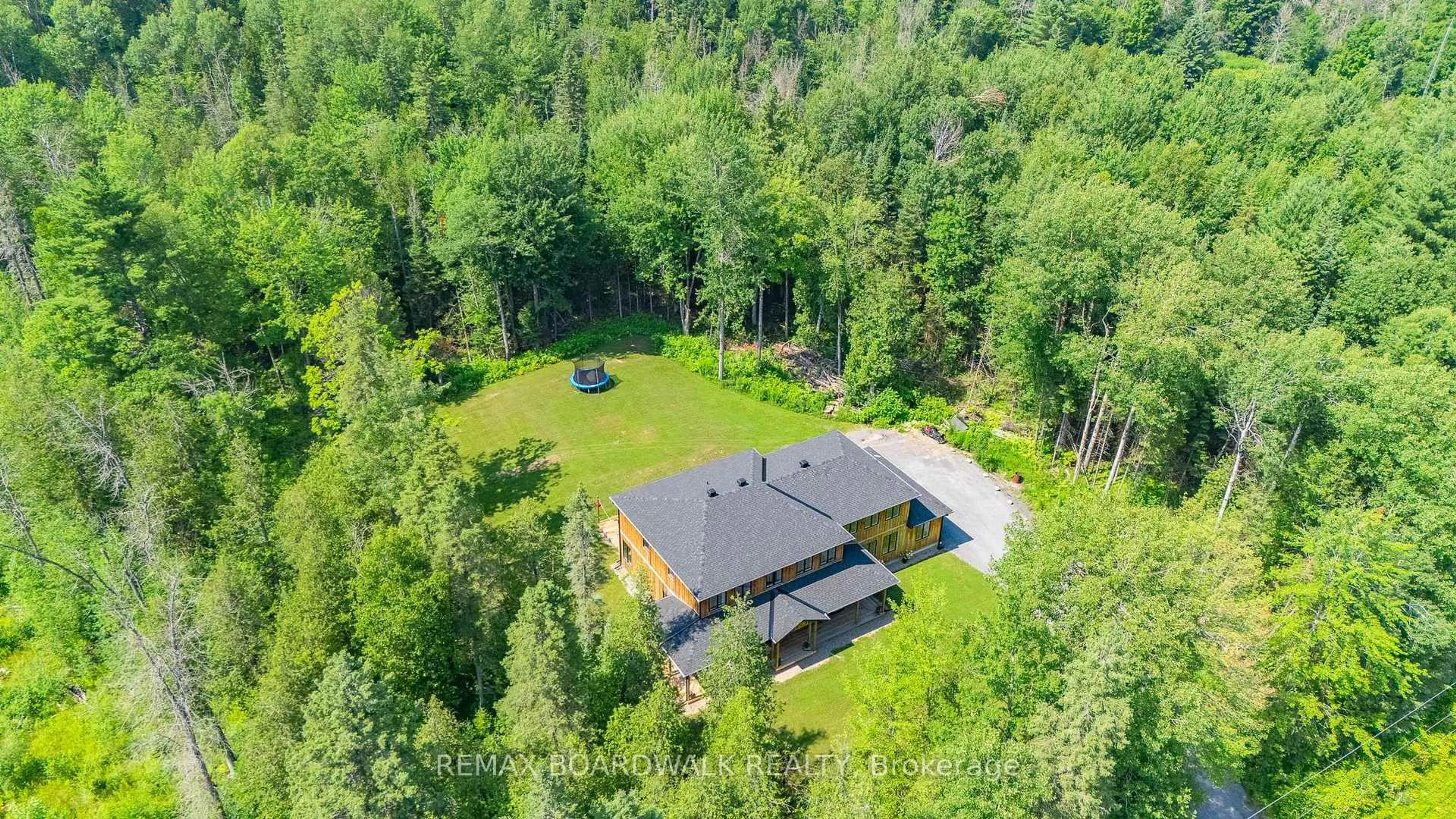 A pic from outside/outdoor area/front of a property/back of a property/a pic from drone, forest/trees view for 150 Maclarens Side Rd, Ottawa Ontario K0A 3M0
