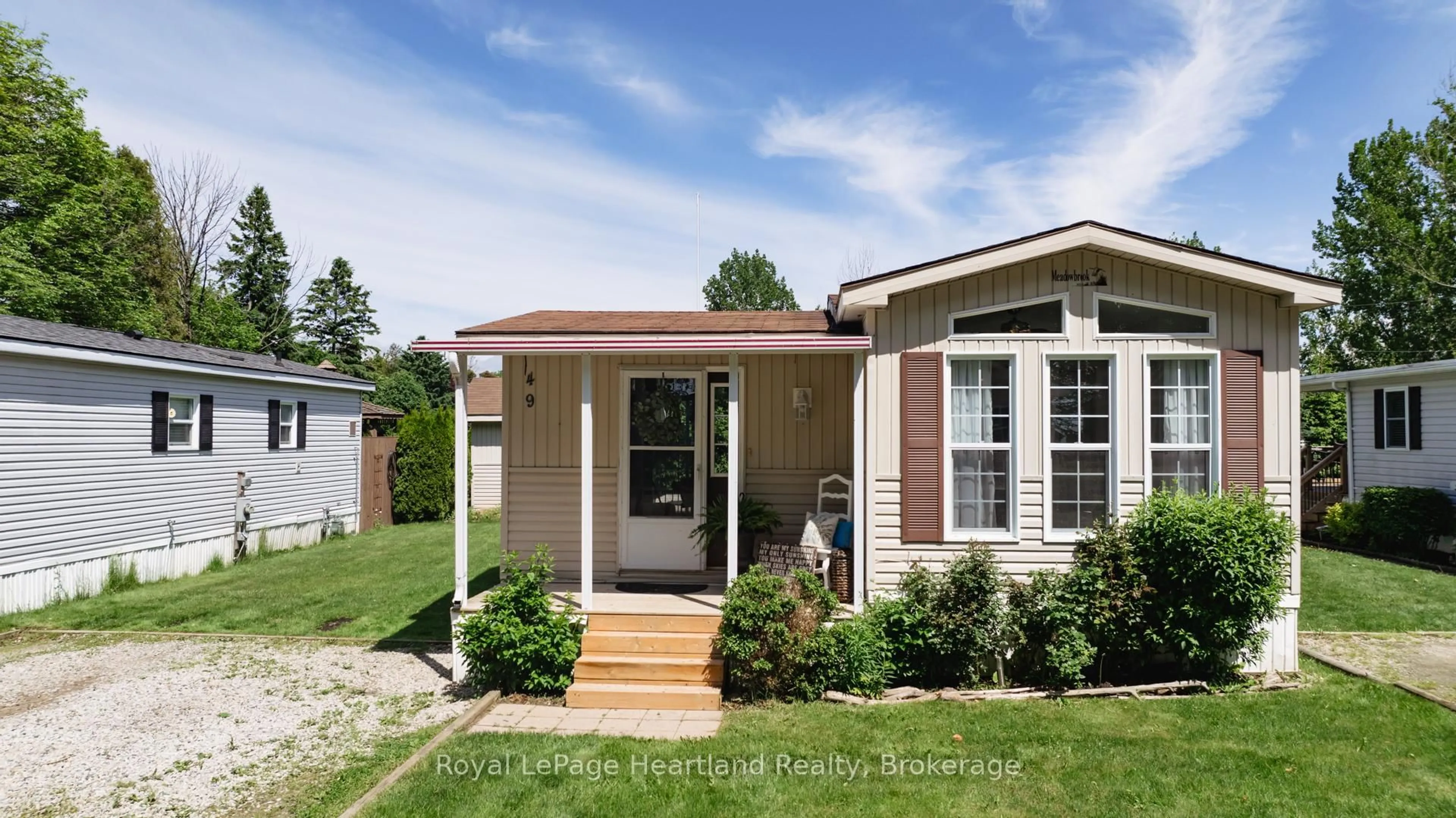 Home with vinyl exterior material, street for 77307 BLUEWATER HIGHWAY #49, Bluewater Ontario N0M 1G0