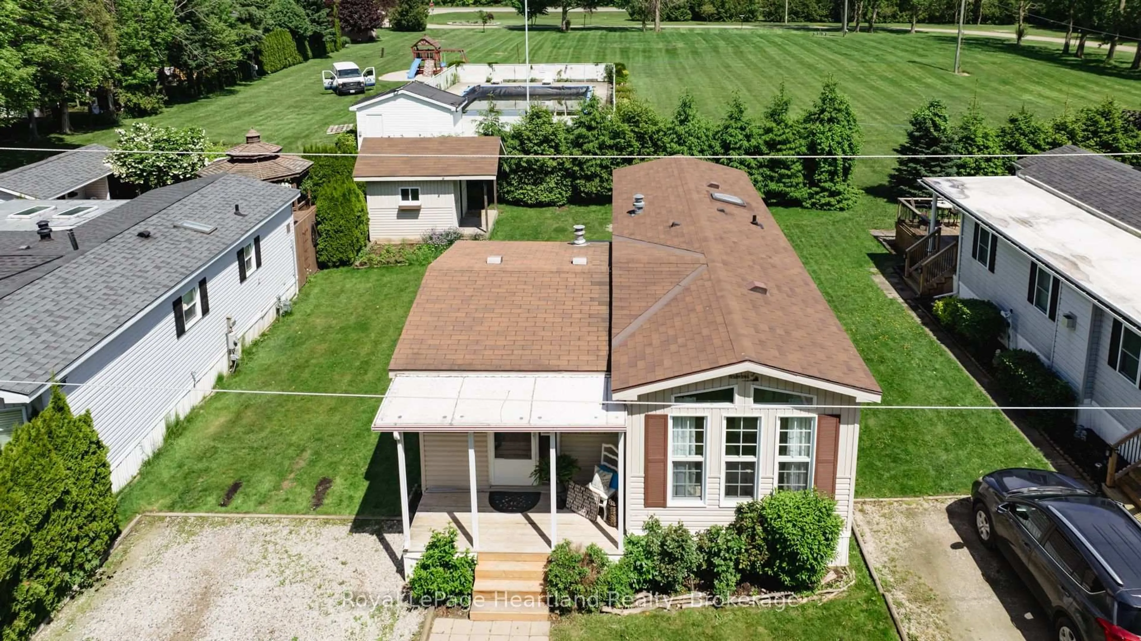 A pic from outside/outdoor area/front of a property/back of a property/a pic from drone, unknown for 77307 BLUEWATER HIGHWAY #49, Bluewater Ontario N0M 1G0