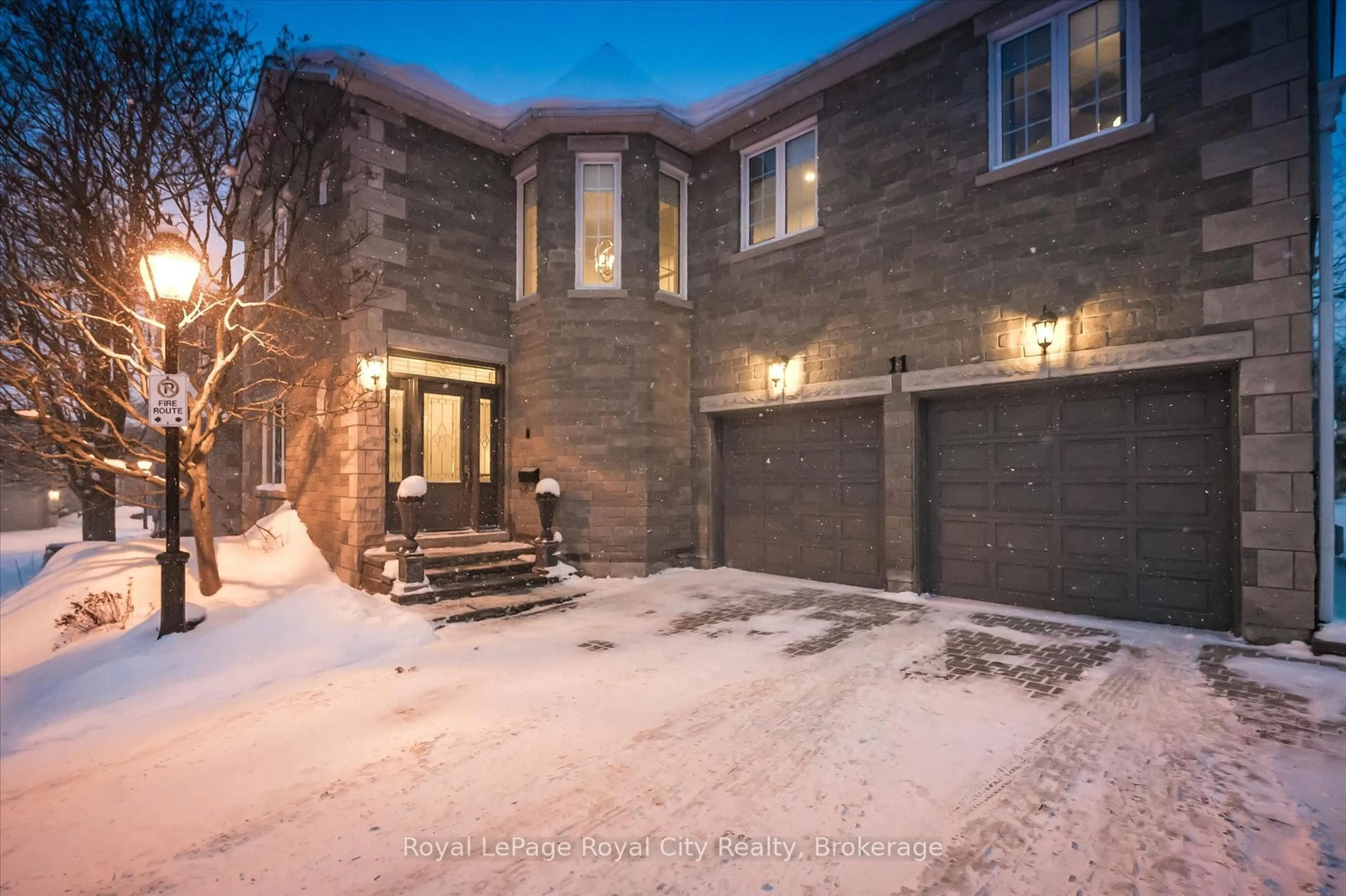 Home with brick exterior material, street for 25 MANOR PARK Cres #11, Guelph Ontario N1G 1A2