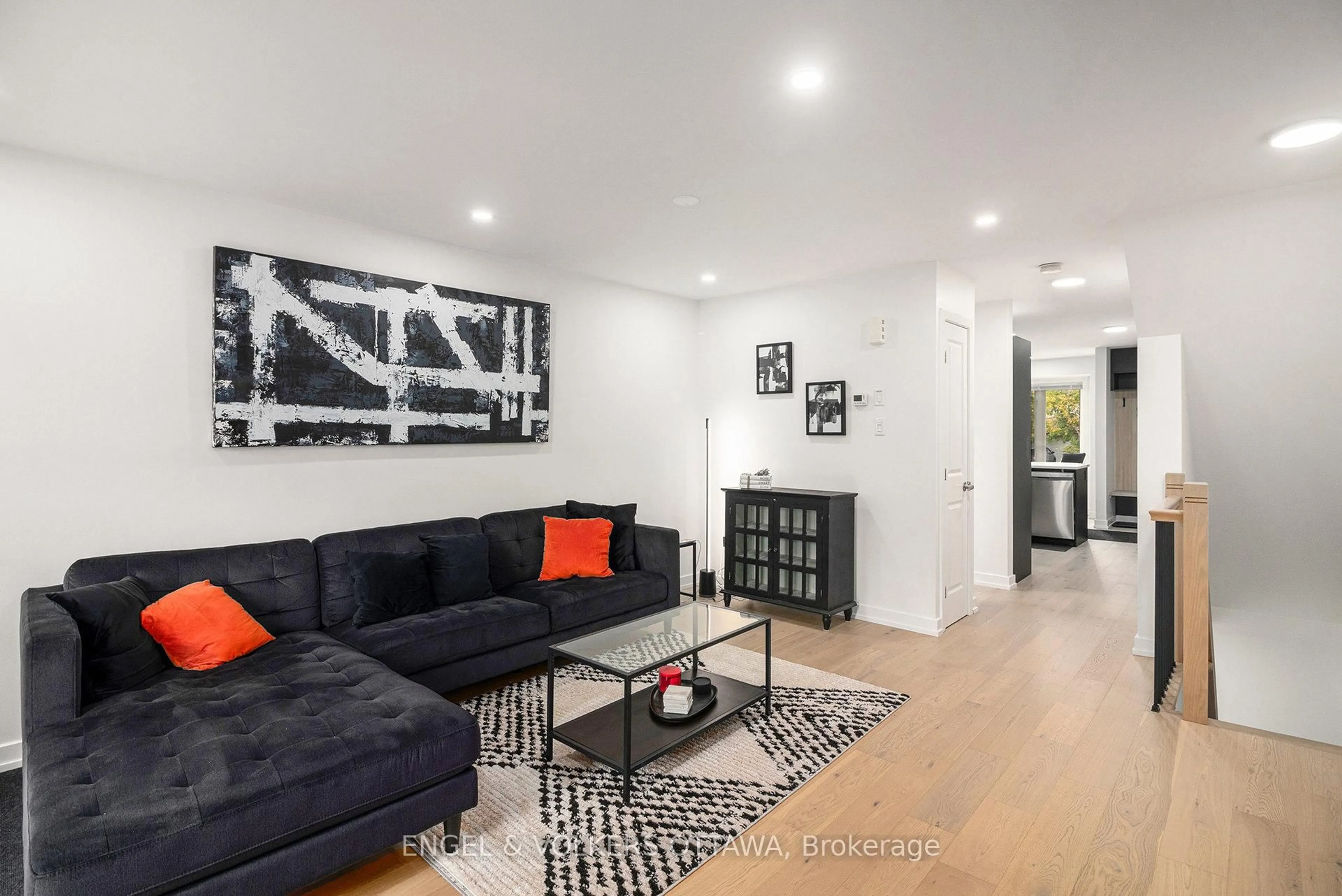 Living room with furniture, unknown for 4522 Innes Rd #D, Ottawa Ontario K4A 0X5