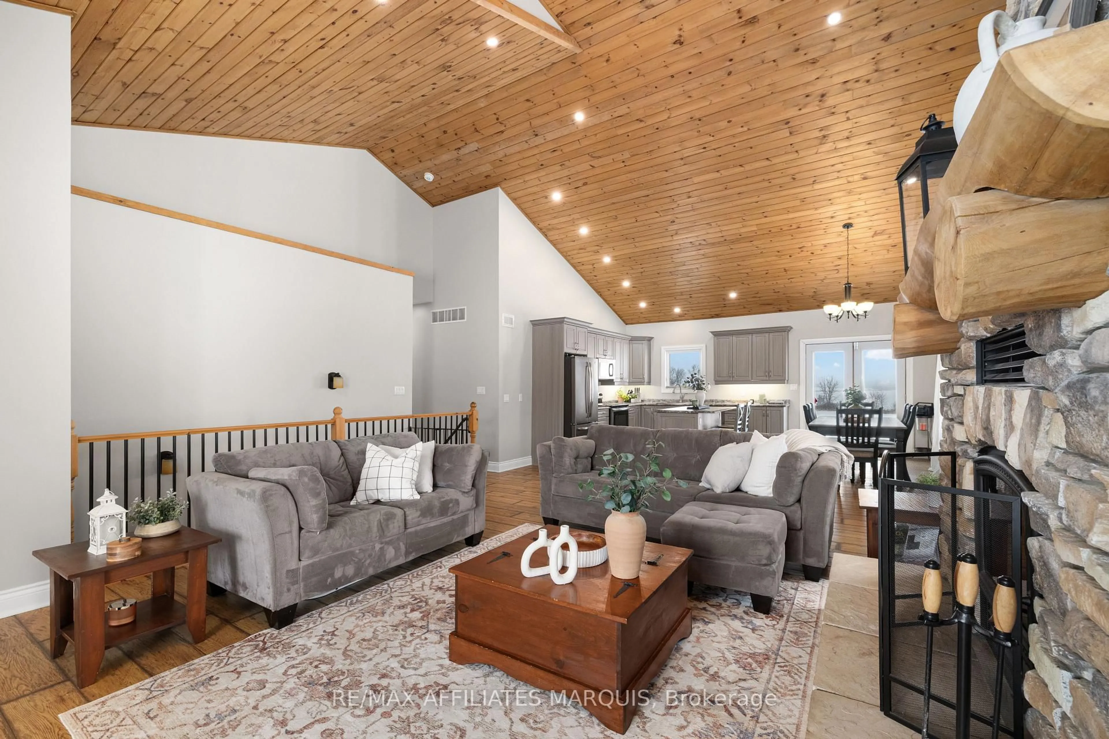 Living room with furniture, wood/laminate floor for 315 Gemmell Rd, Merrickville-Wolford Ontario K0G 1G0