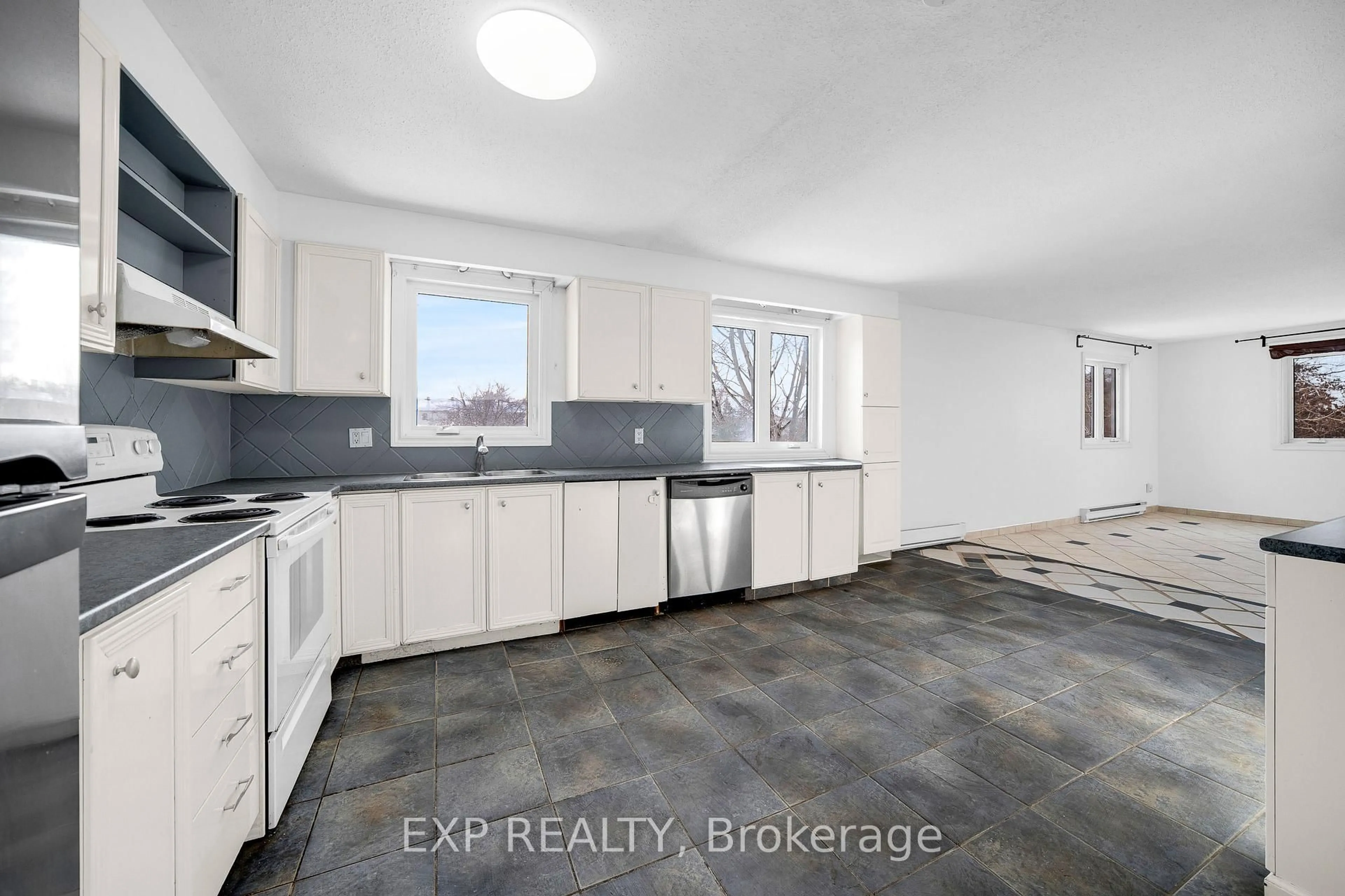Open concept kitchen, ceramic/tile floor for 98 Castlegreen Private, Ottawa Ontario K1T 3N3