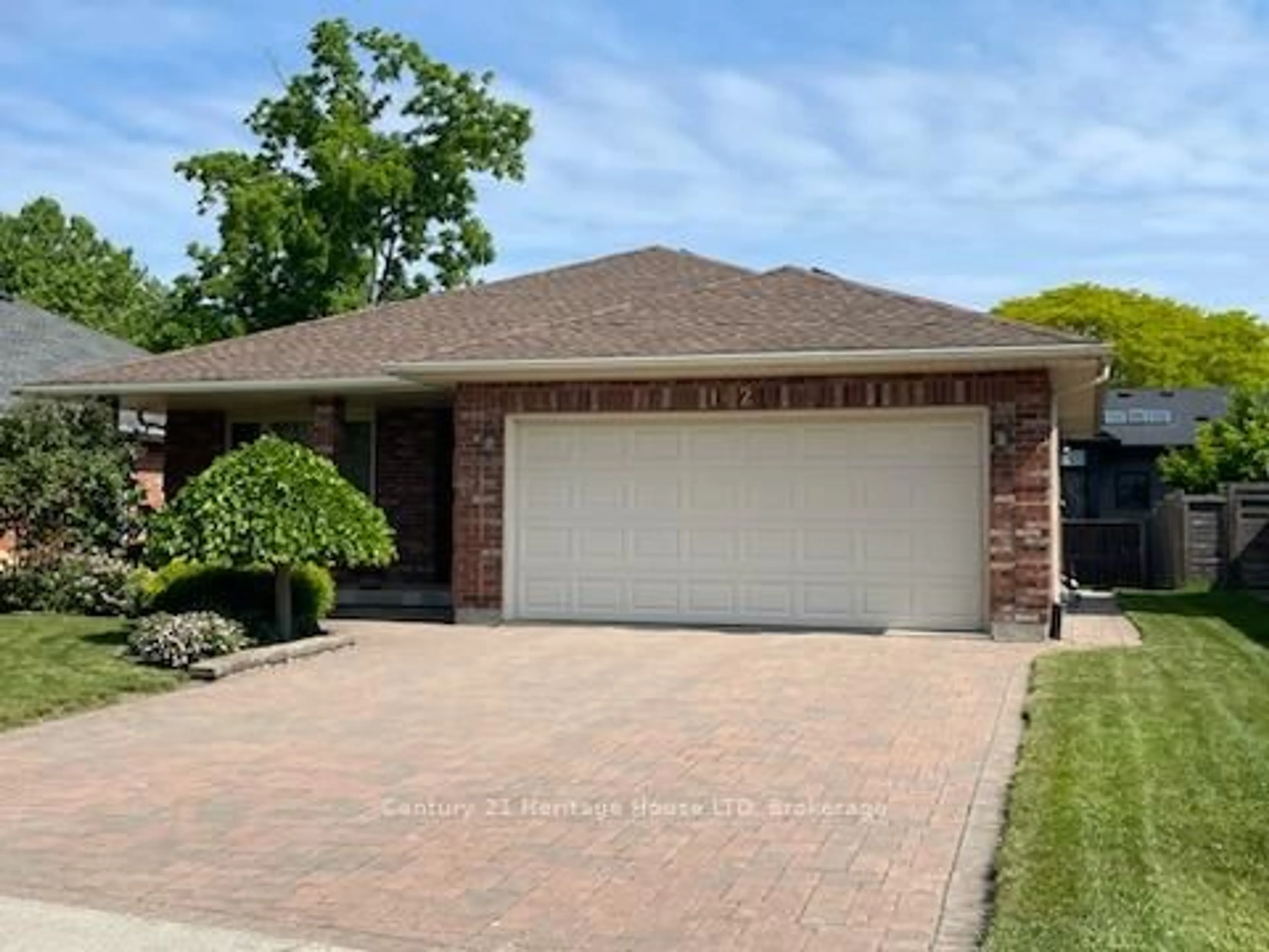 Home with brick exterior material, street for 102 Wellandvale Dr, Welland Ontario L3C 7C7