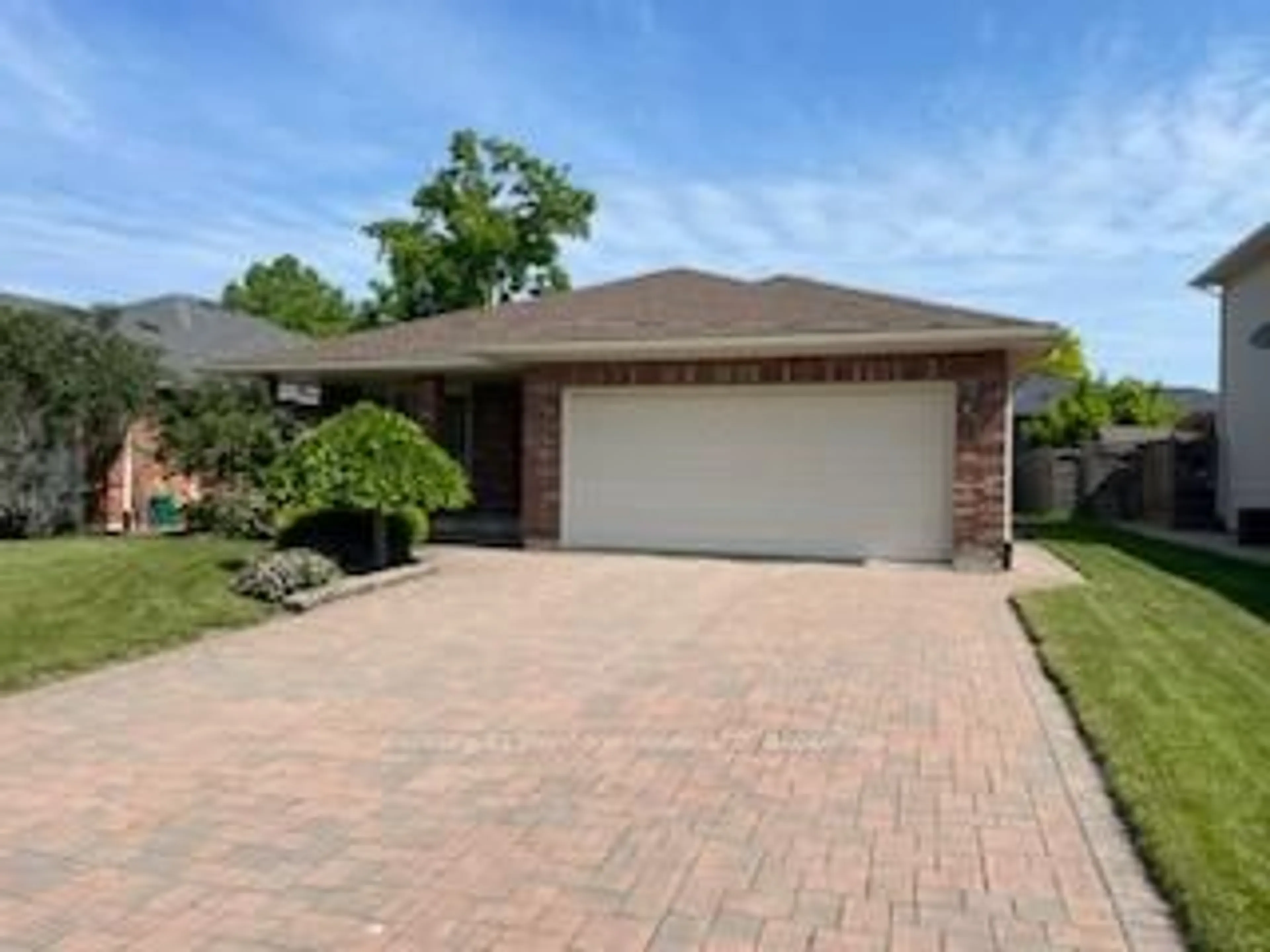 Home with brick exterior material, street for 102 Wellandvale Dr, Welland Ontario L3C 7C7