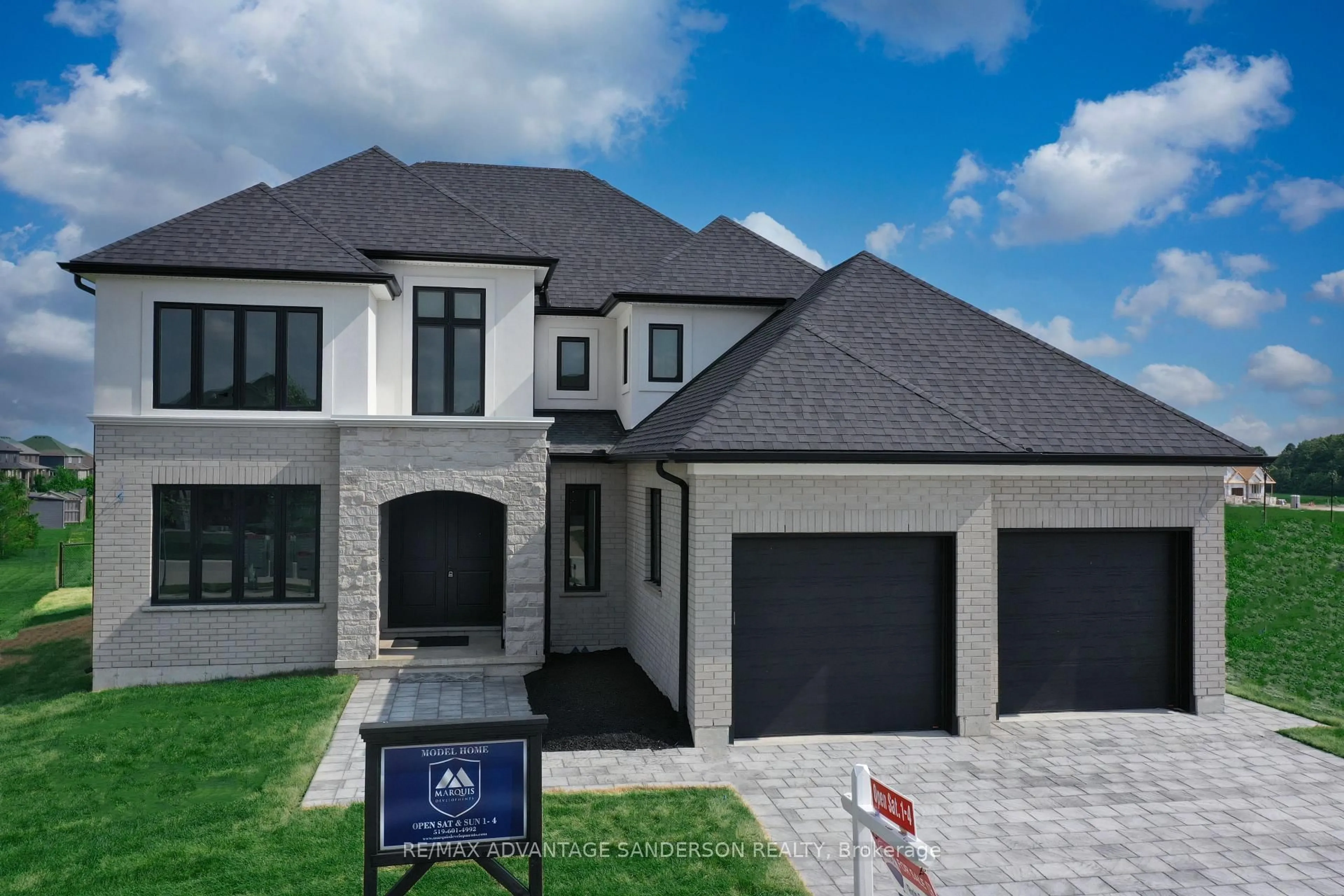 Home with brick exterior material, street for 243 Songbird Lane, Middlesex Centre Ontario N0M 2A0