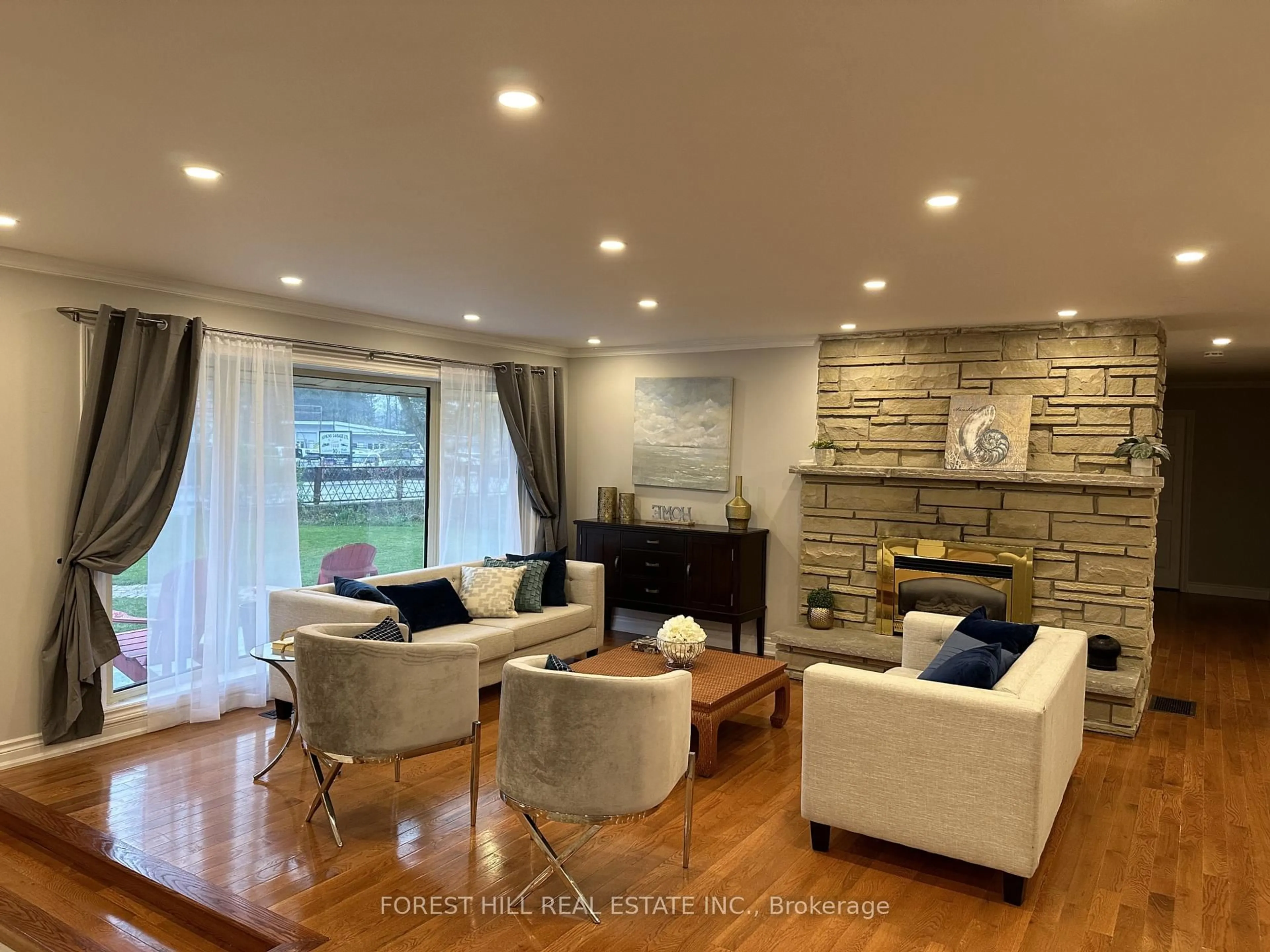 Living room with furniture, wood/laminate floor for 380 ASHLEY St, Corbyville Ontario K0K 1V0