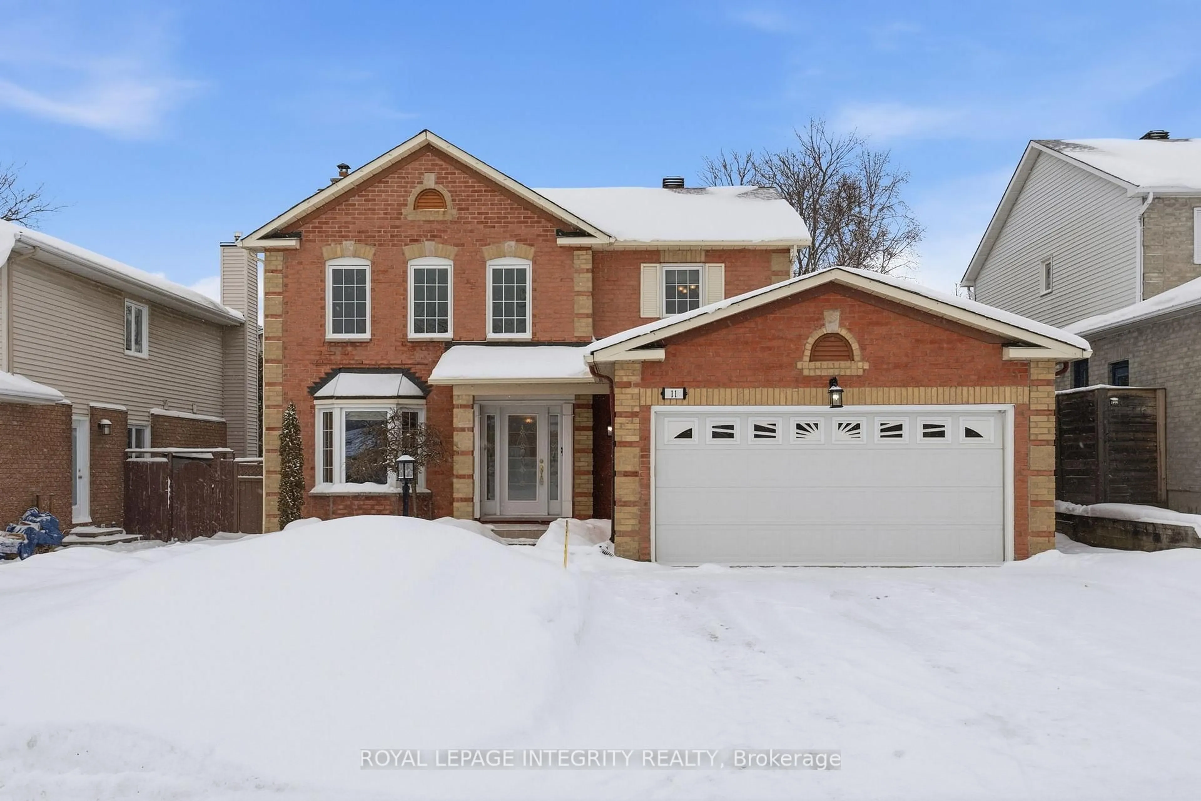 Home with brick exterior material, street for 11 Rosethorn Way, Kanata Ontario K2M 1P9