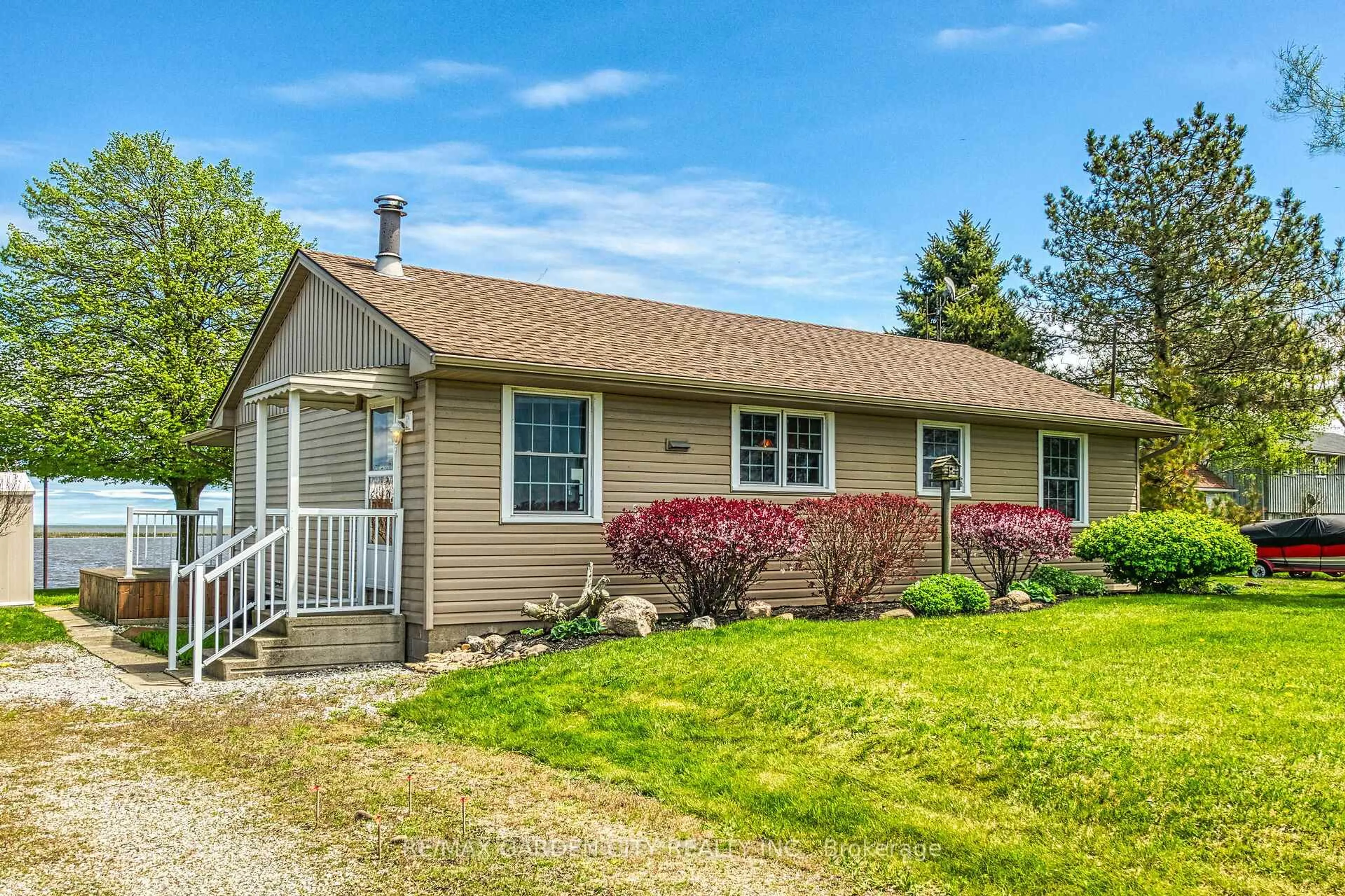 Home with vinyl exterior material, street for 794 59 Highway, Norfolk Ontario N0E 1M0