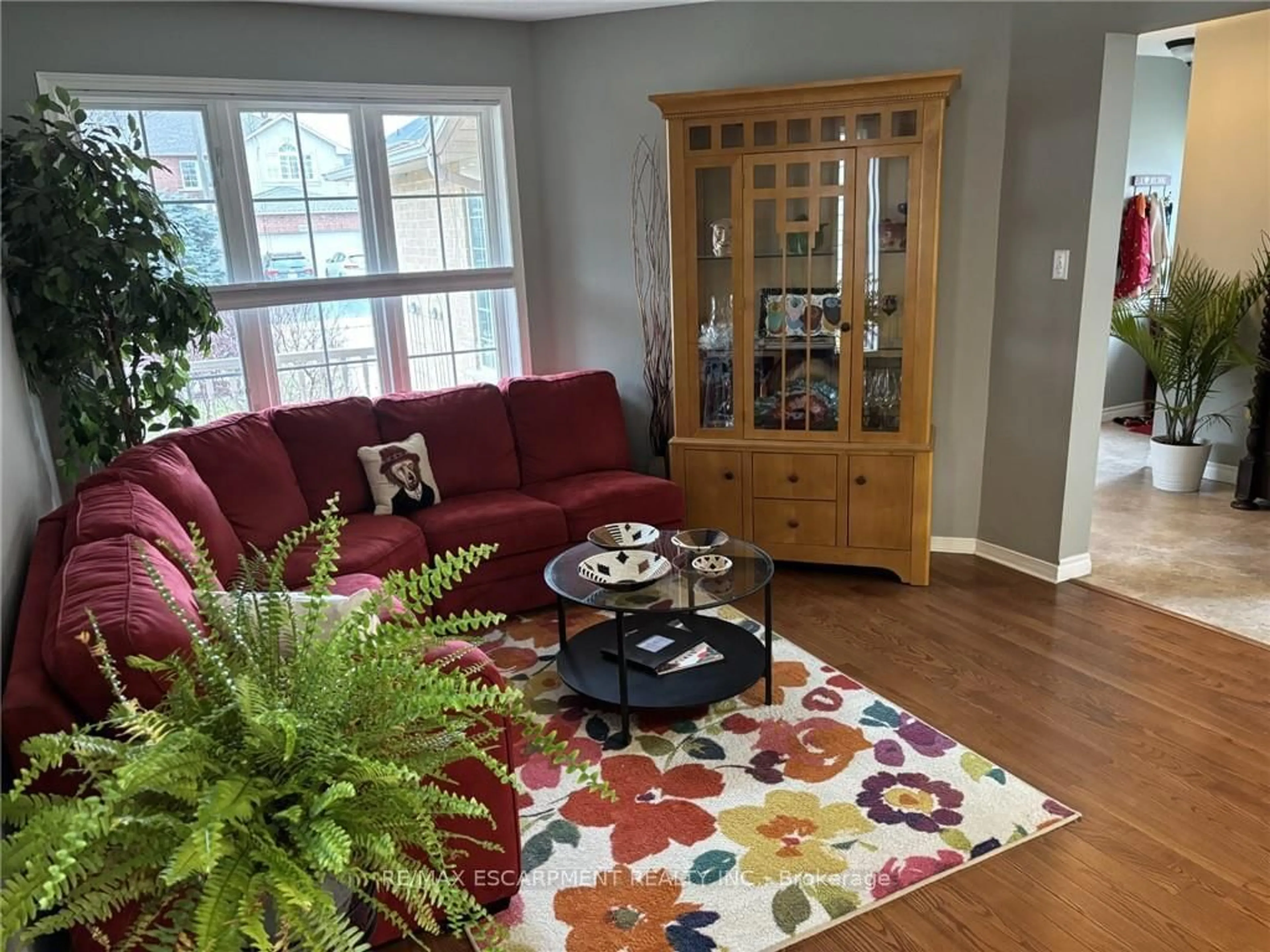 Living room with furniture, wood/laminate floor for 111 Duncairn Cres, Hamilton Ontario L9C 6E9