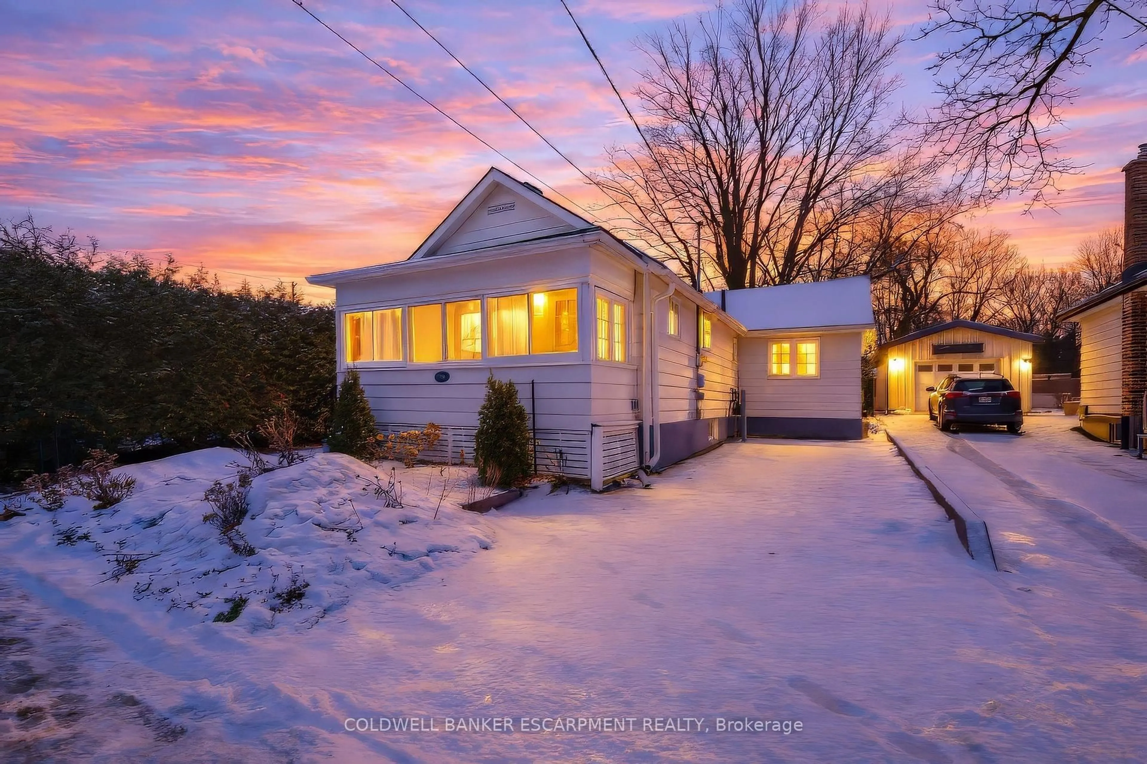 A pic from outside/outdoor area/front of a property/back of a property/a pic from drone, street for 14 Laurine Ave, Guelph Ontario N1E 4M9