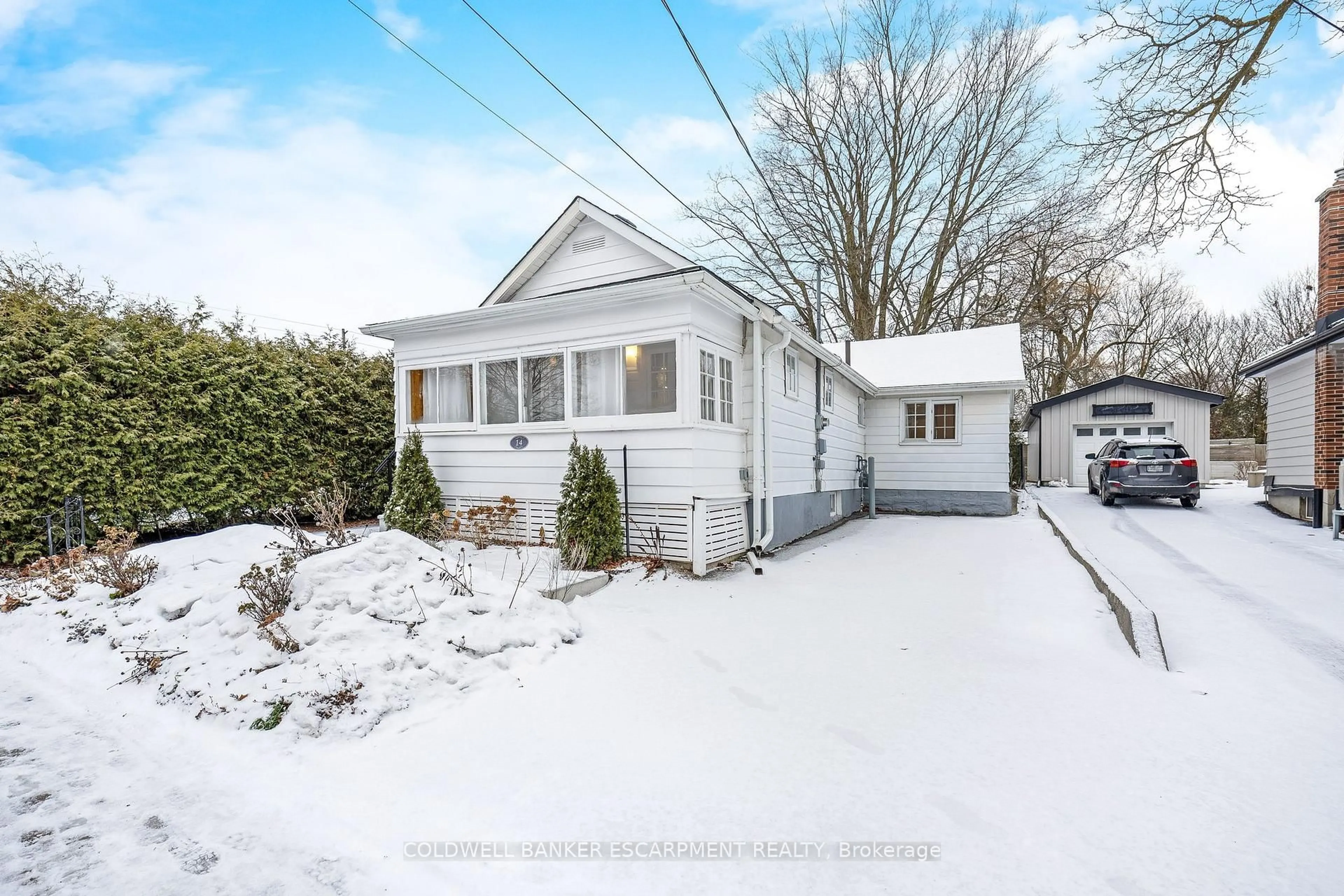 A pic from outside/outdoor area/front of a property/back of a property/a pic from drone, street for 14 Laurine Ave, Guelph Ontario N1E 4M9
