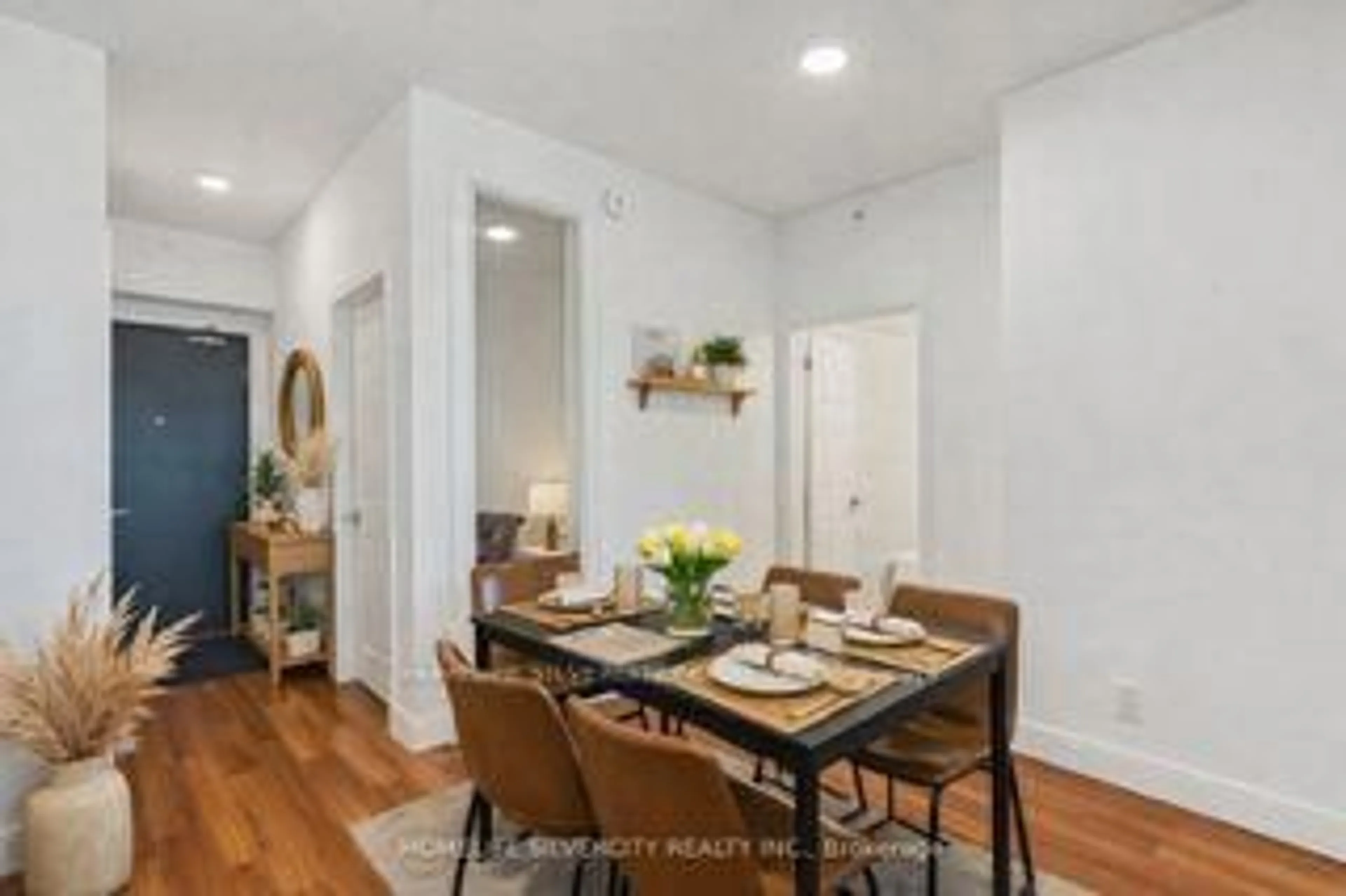 Dining room, wood/laminate floor for 1 Wellington St #615, Brantford Ontario N3T 2L3