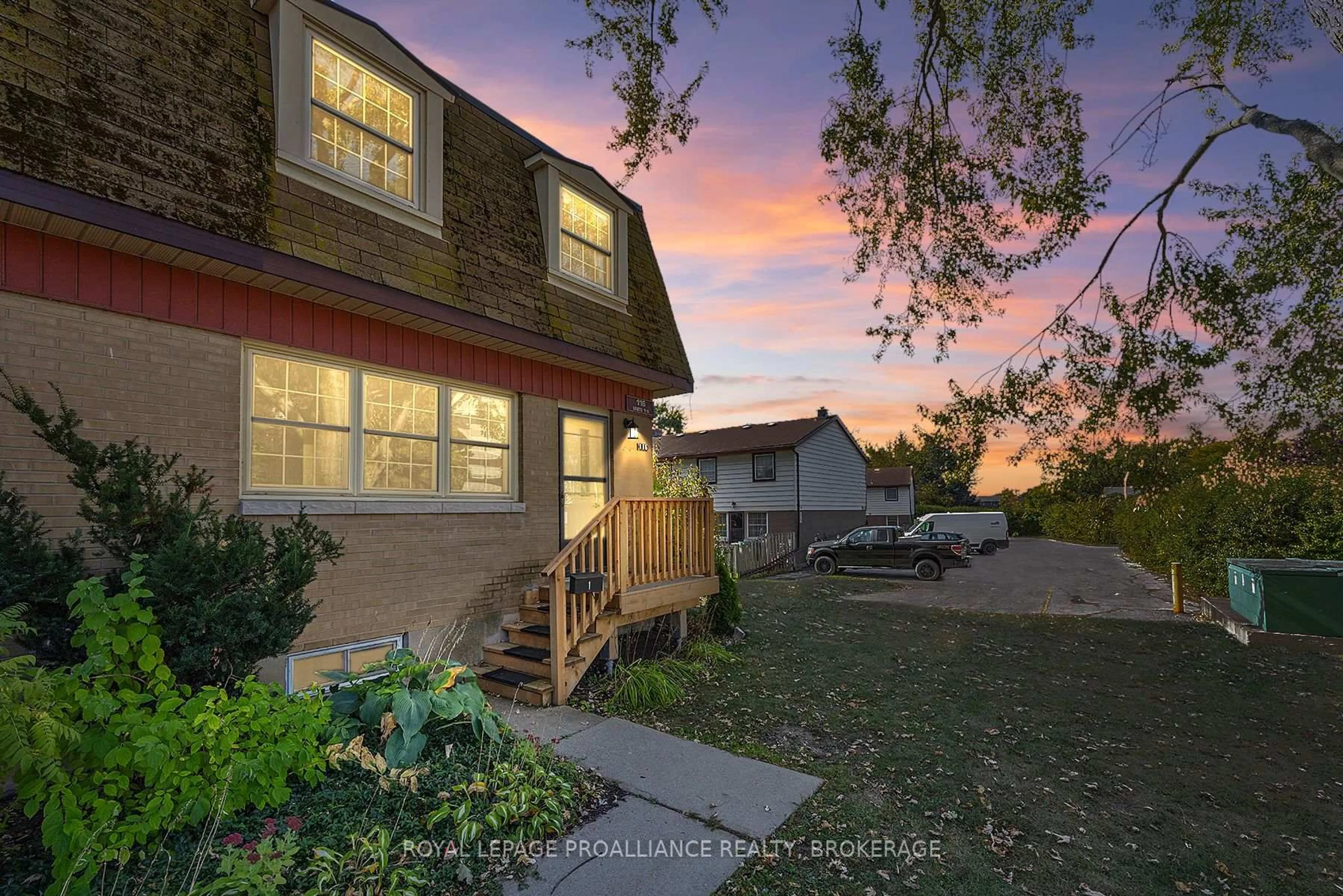 A pic from outside/outdoor area/front of a property/back of a property/a pic from drone, street for 116 Notch Hill Rd #1, Kingston Ontario K7M 2X1