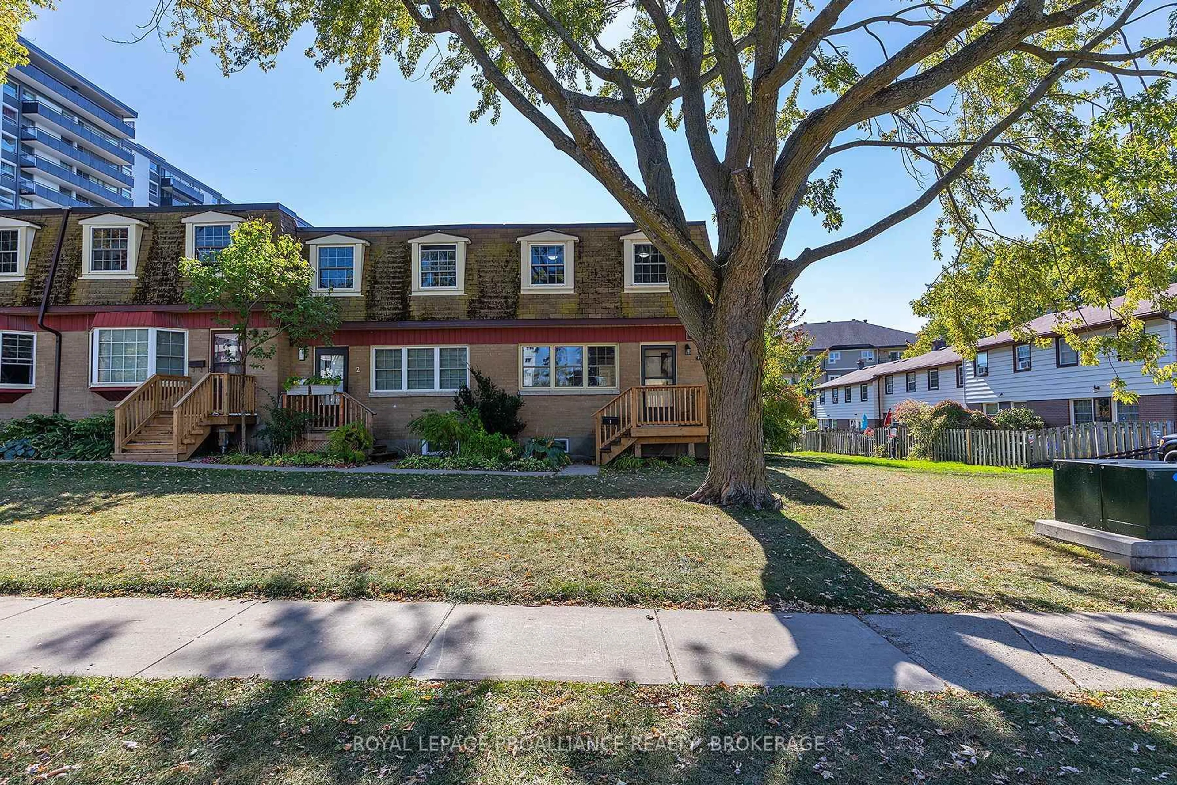 A pic from outside/outdoor area/front of a property/back of a property/a pic from drone, street for 116 Notch Hill Rd #1, Kingston Ontario K7M 2X1