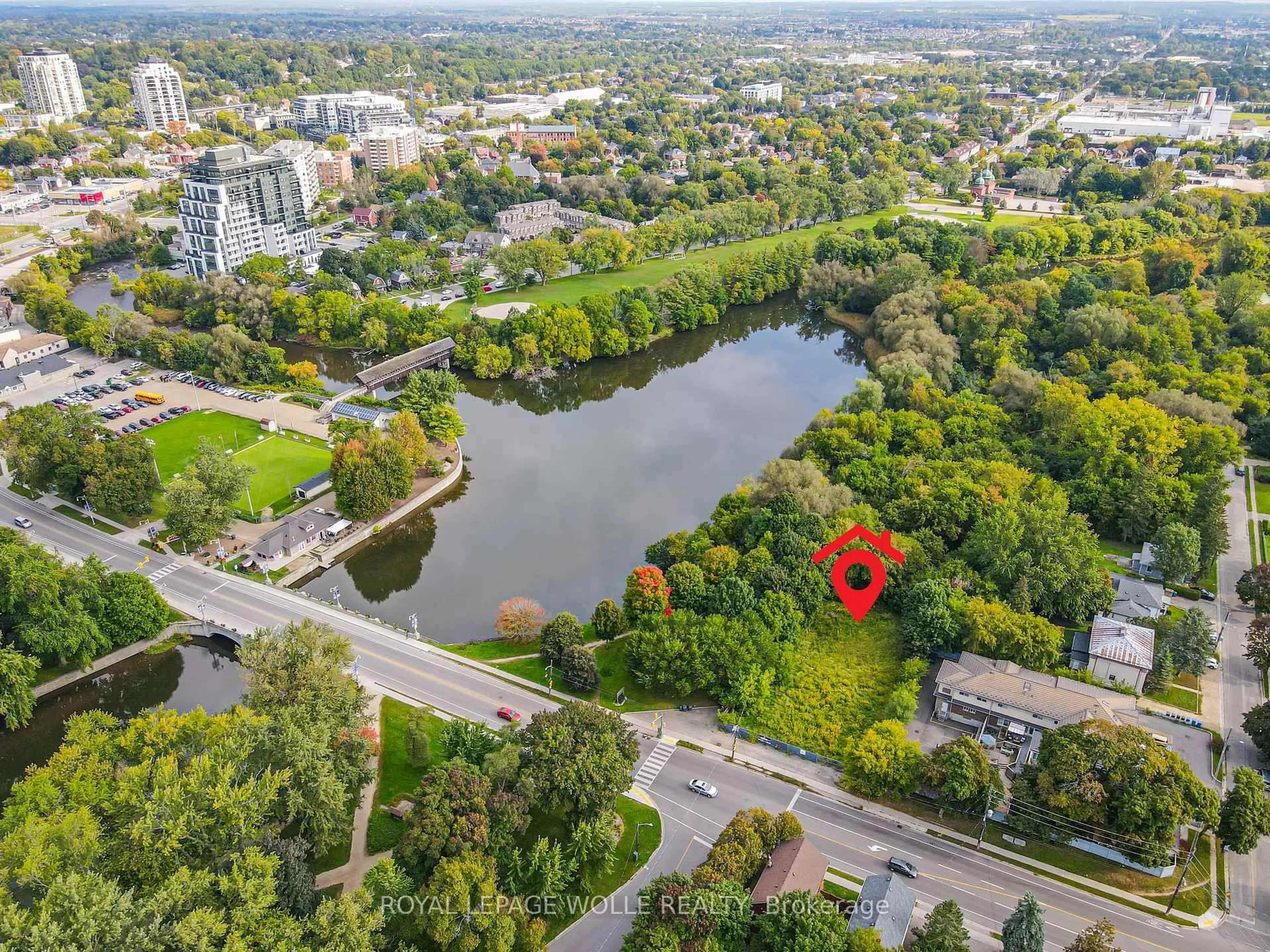 A pic from outside/outdoor area/front of a property/back of a property/a pic from drone, water/lake/river/ocean view for 180 Gordon St #7, Guelph Ontario N1G 1X1