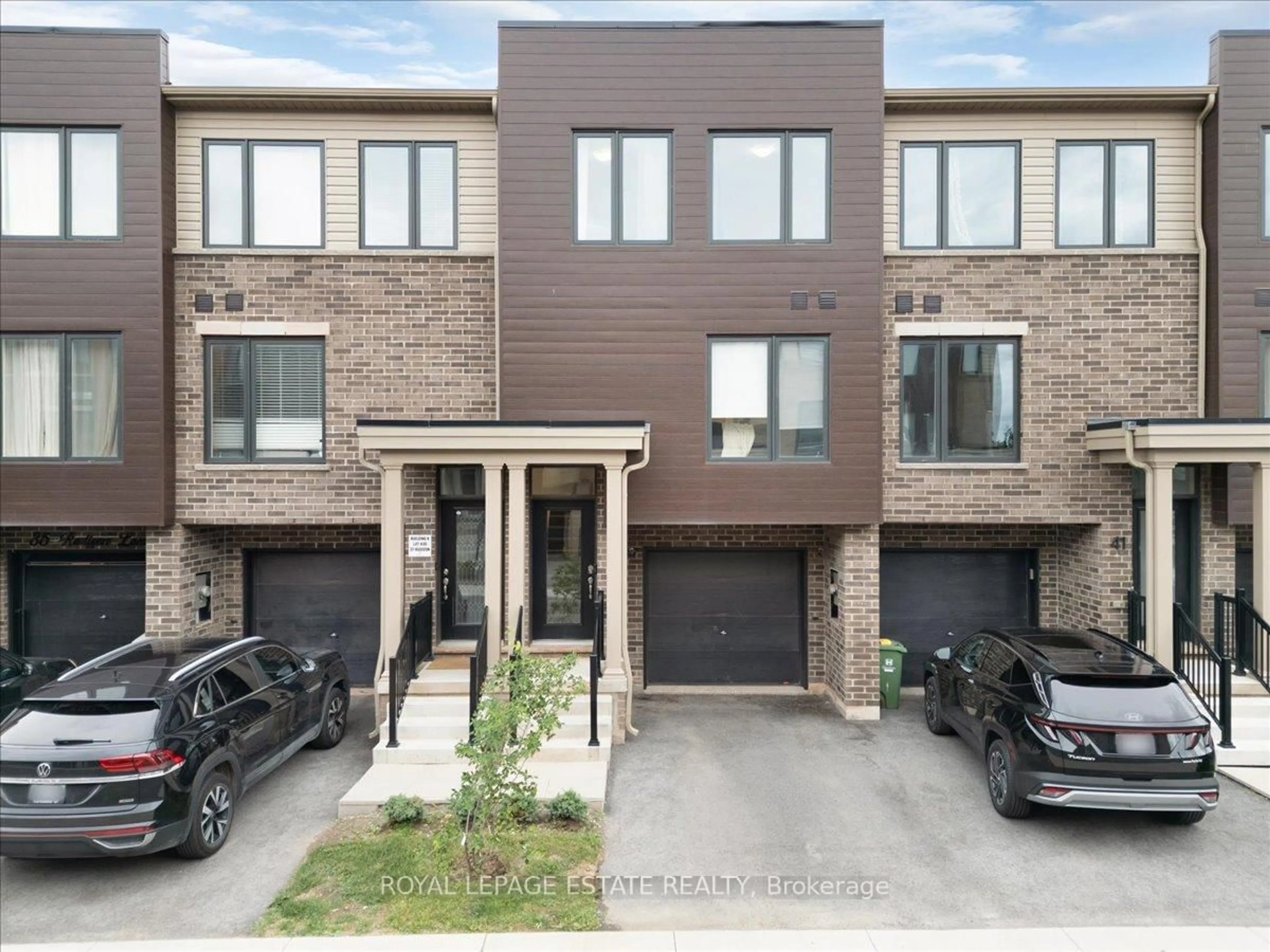 Home with brick exterior material, street for 39 Radison Lane, Hamilton Ontario L8H 0B5