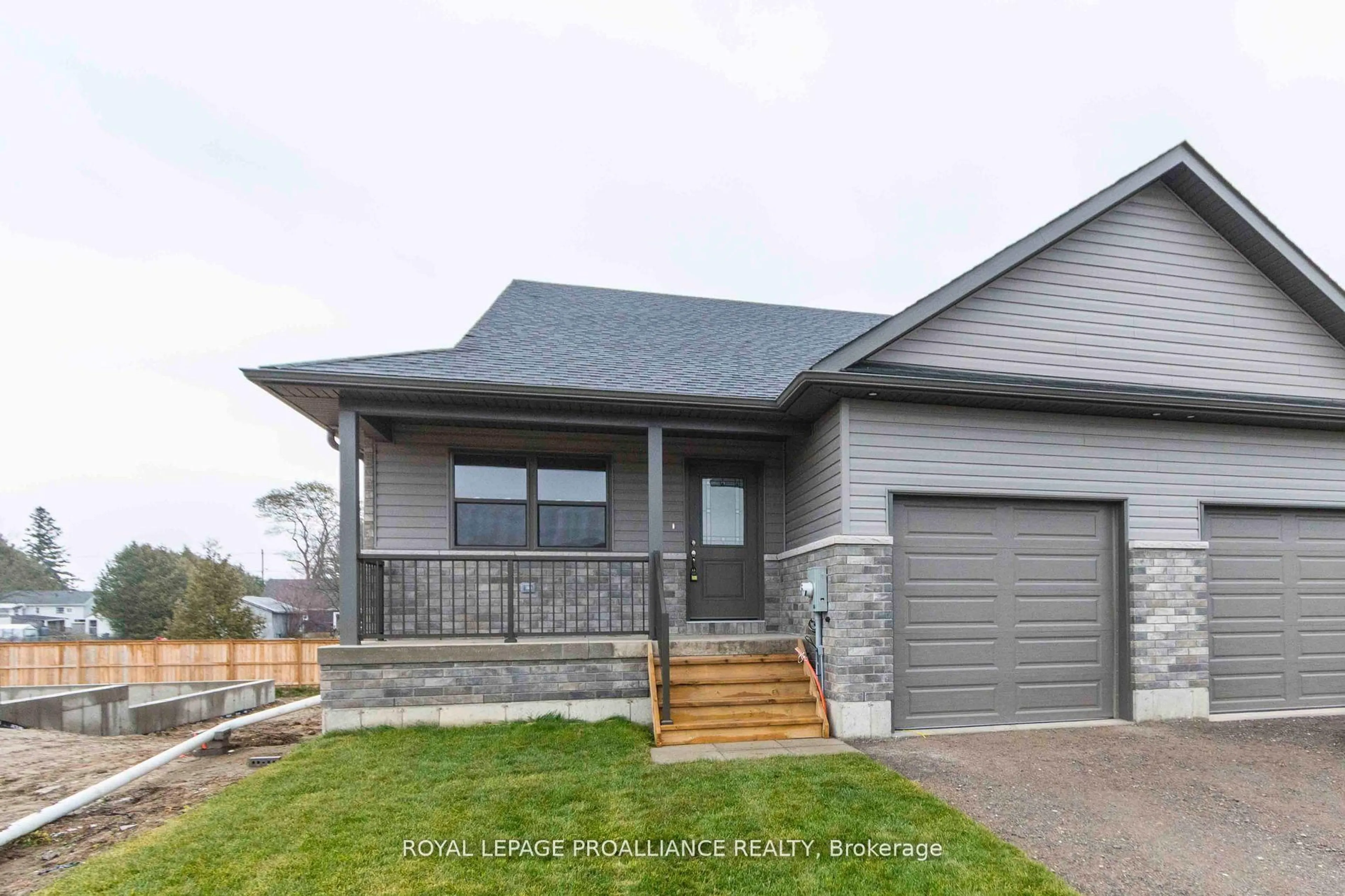 Home with vinyl exterior material, street for 33 Clayton John Ave, Brighton Ontario K0K 1H0