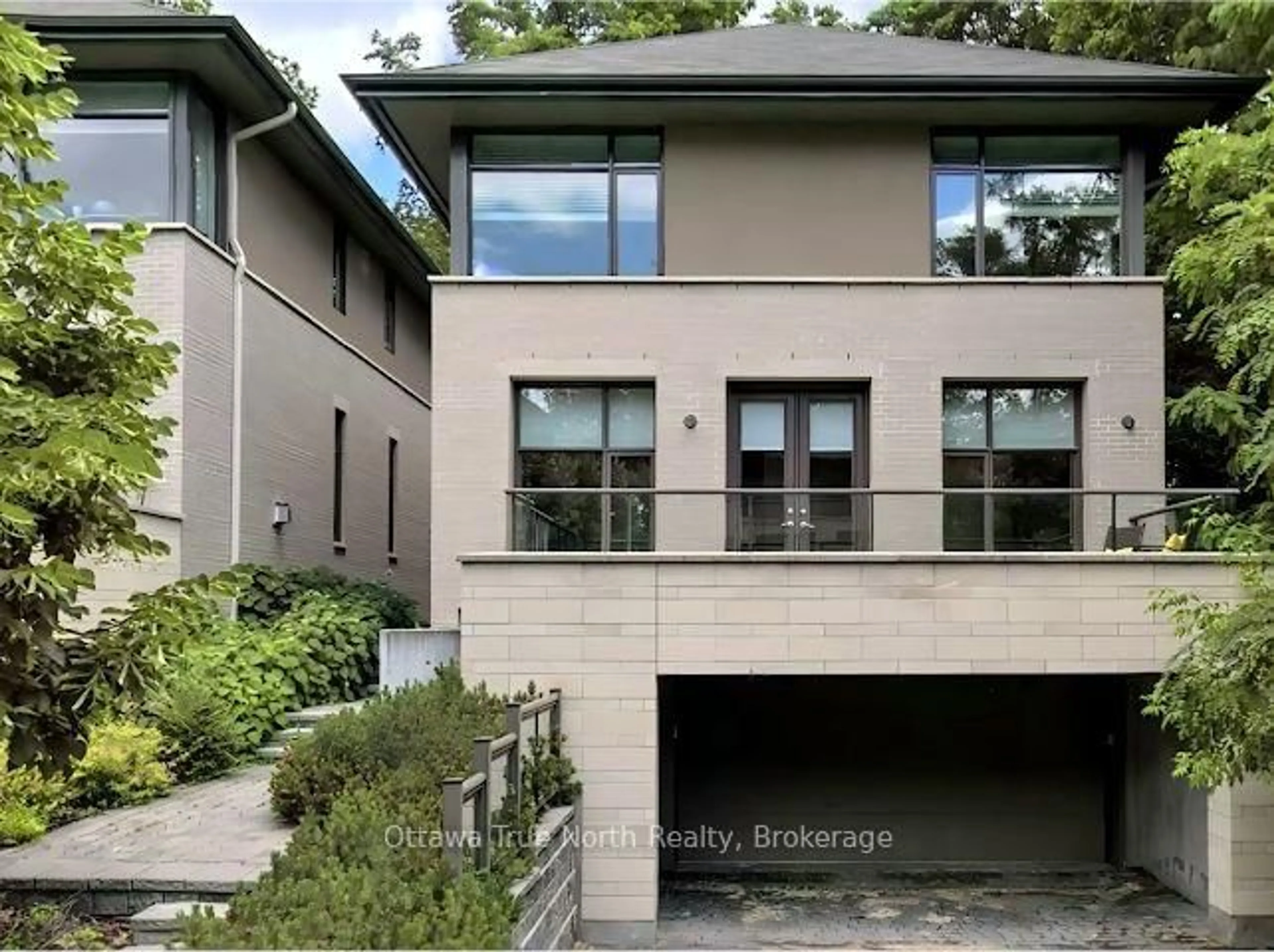 Home with brick exterior material, street for 105 Black Maple Private, Ottawa Ontario K1M 0J3