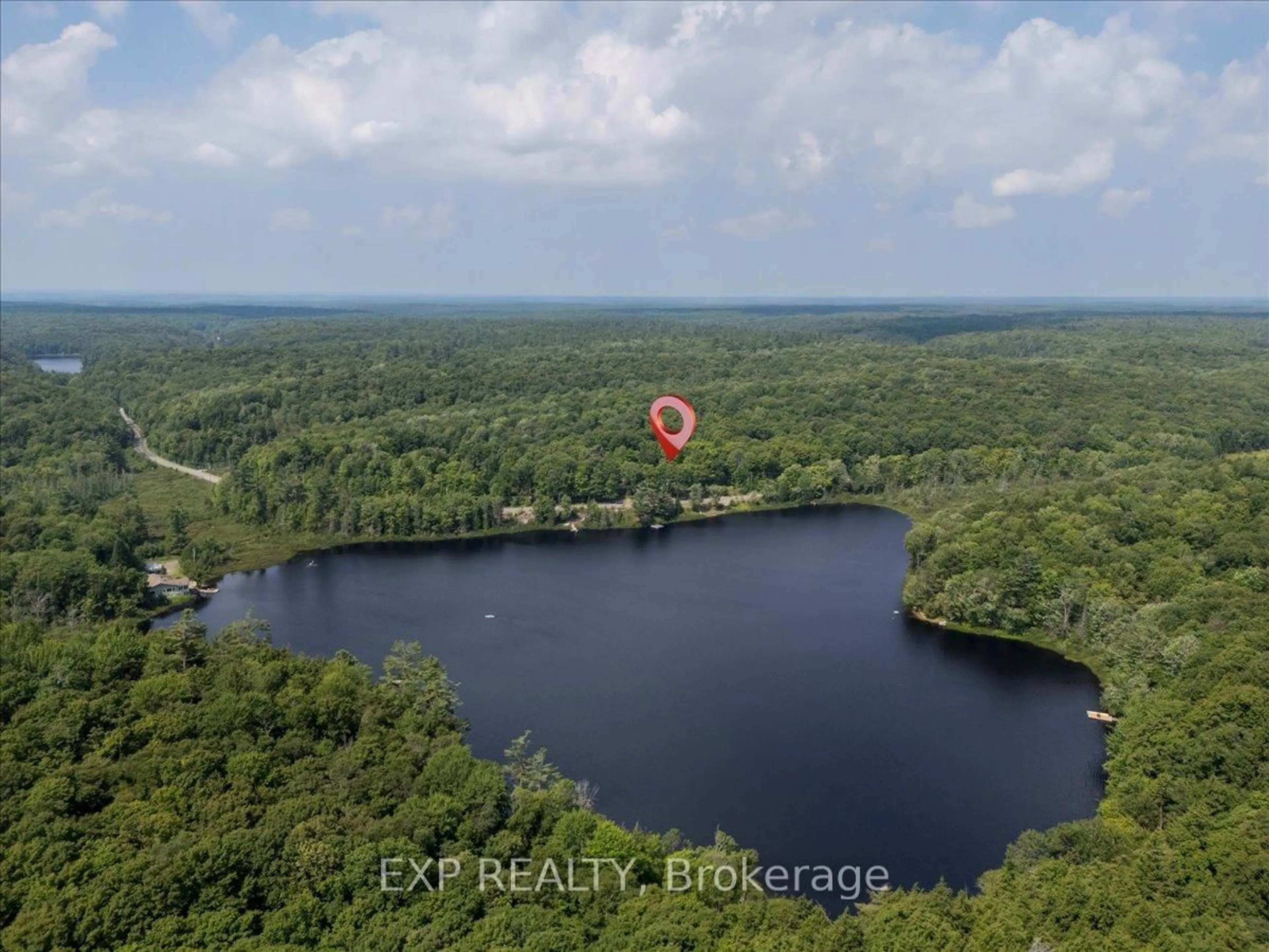 A pic from outside/outdoor area/front of a property/back of a property/a pic from drone, water/lake/river/ocean view for 1867 Fraserburg Rd, Bracebridge Ontario P1L 1X3