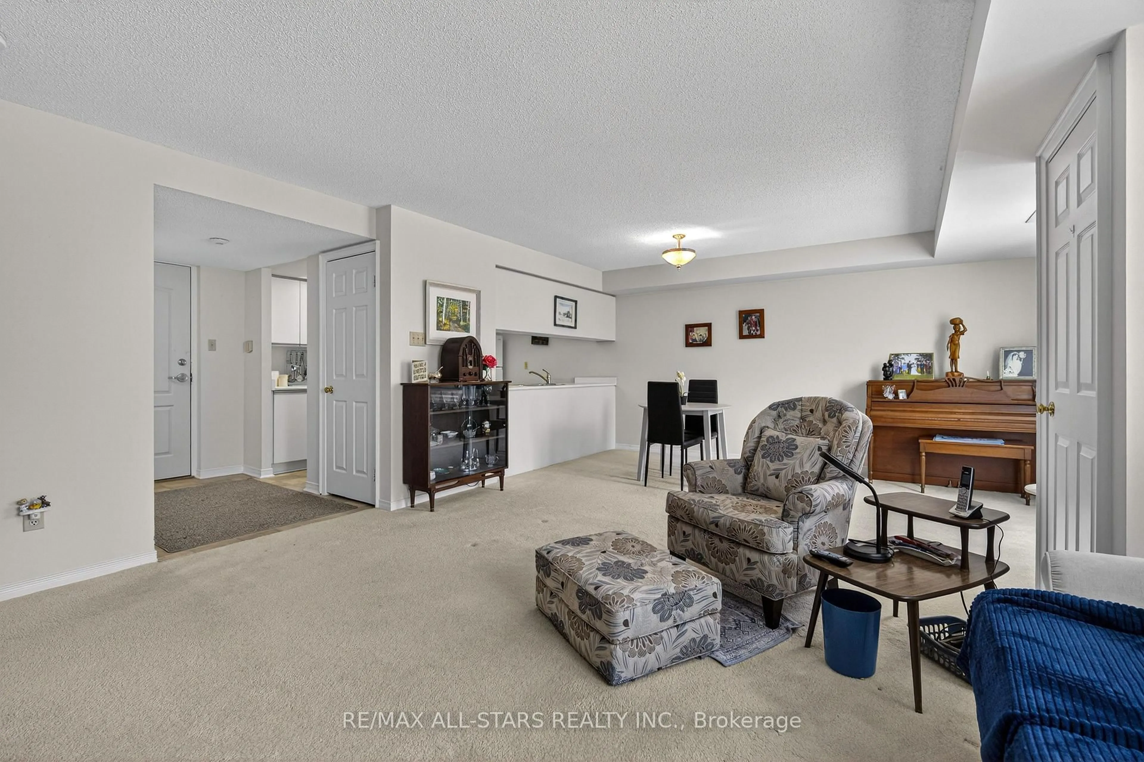 Living room with furniture, unknown for 50 Rivermill Blvd #307, Kawartha Lakes Ontario K9V 6C1