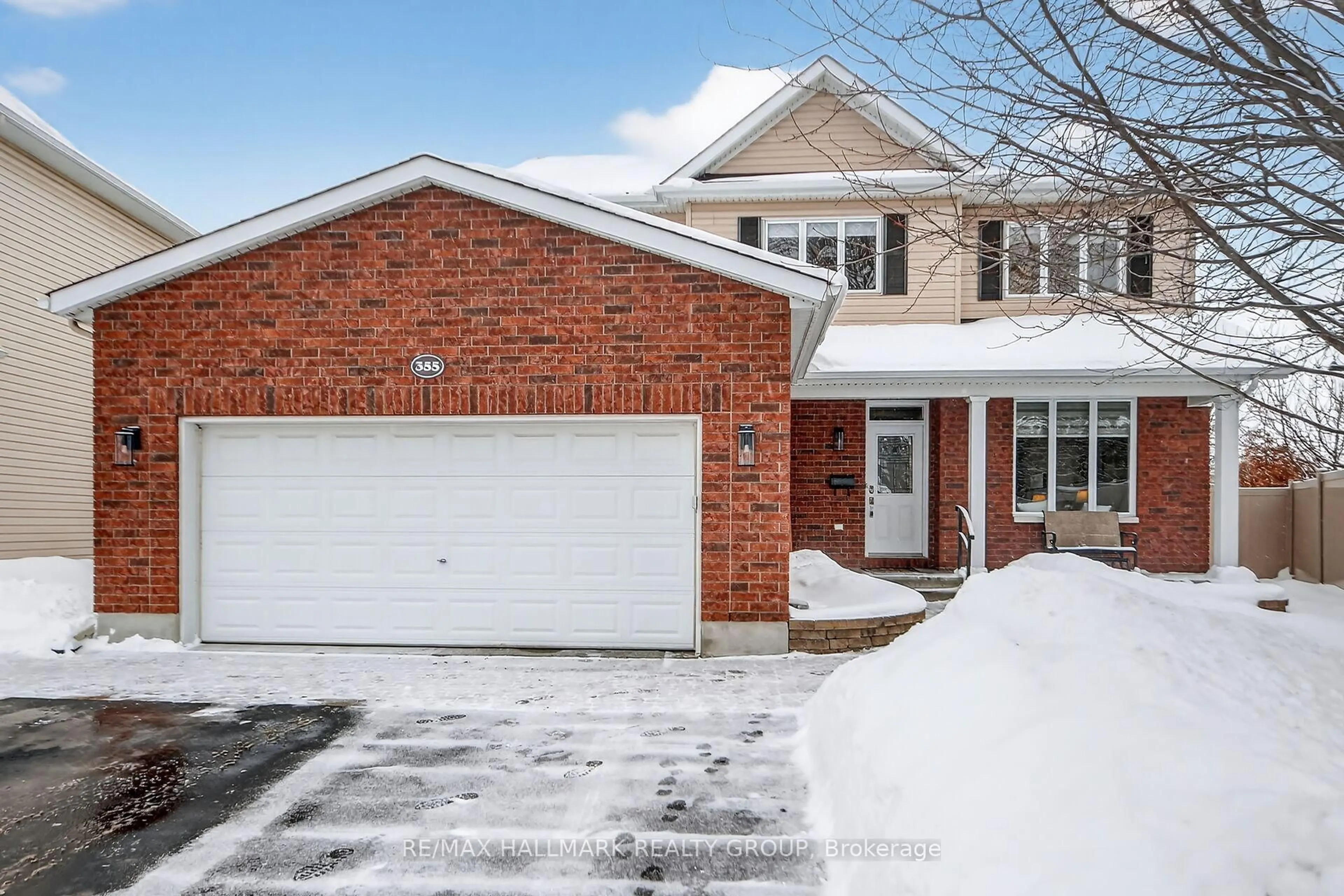 Home with brick exterior material, street for 355 West Ridge Dr, Stittsville Ontario K2S 2G8