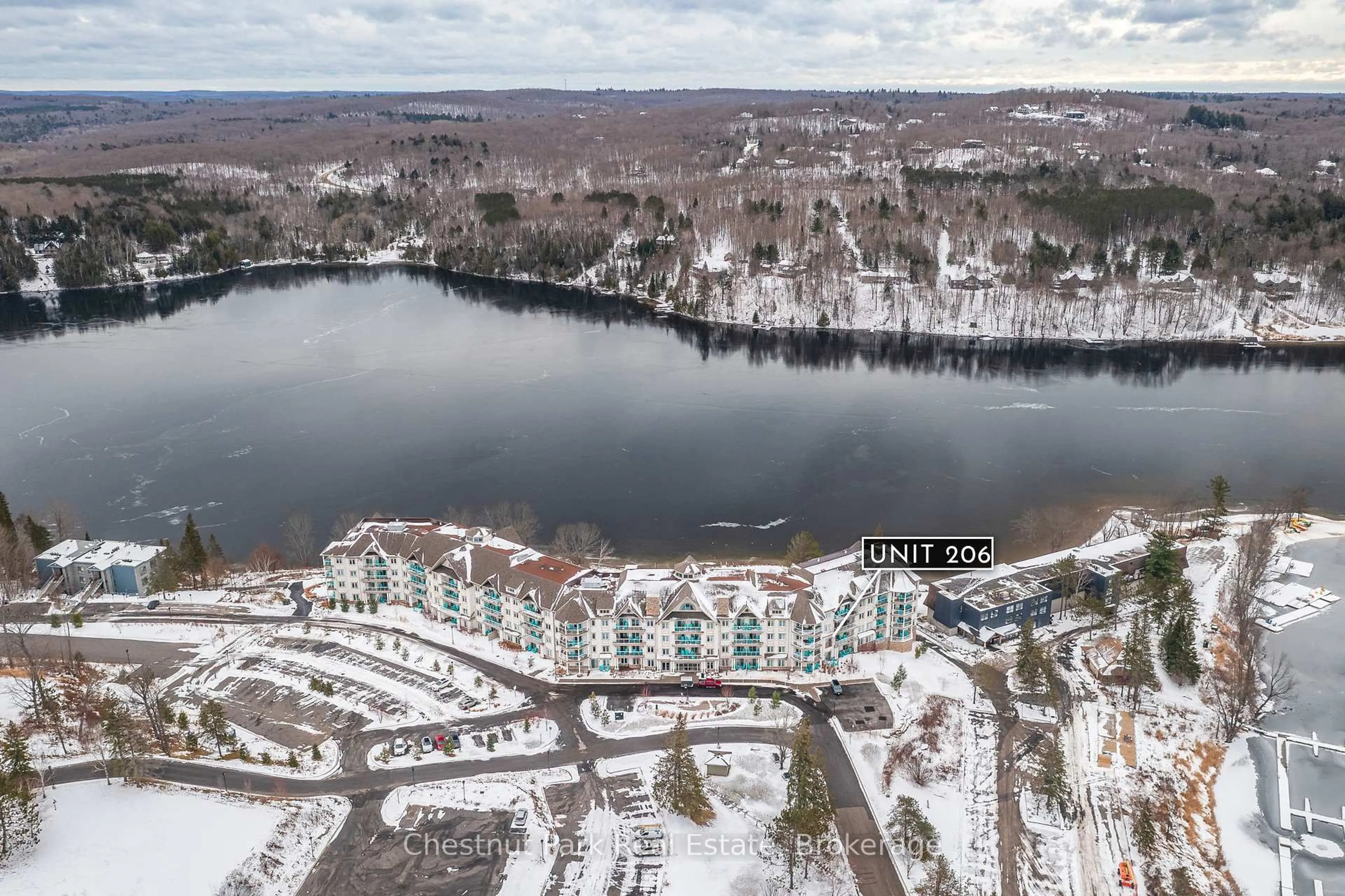 A pic from outside/outdoor area/front of a property/back of a property/a pic from drone, water/lake/river/ocean view for 25 Pen Lake Point Rd #206, Huntsville Ontario P1H 1A9