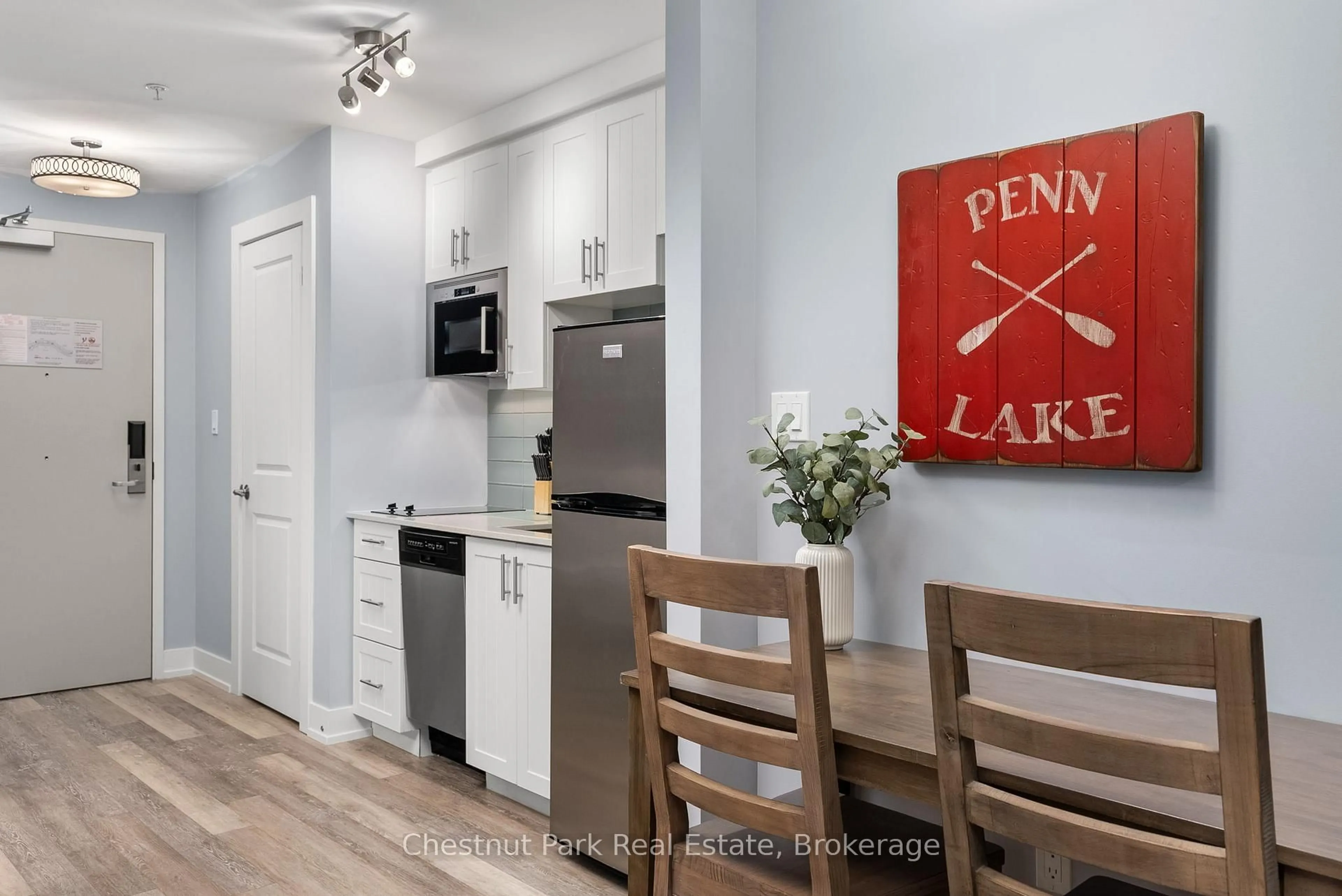 Standard kitchen, wood/laminate floor for 25 Pen Lake Point Rd #206, Huntsville Ontario P1H 1A9