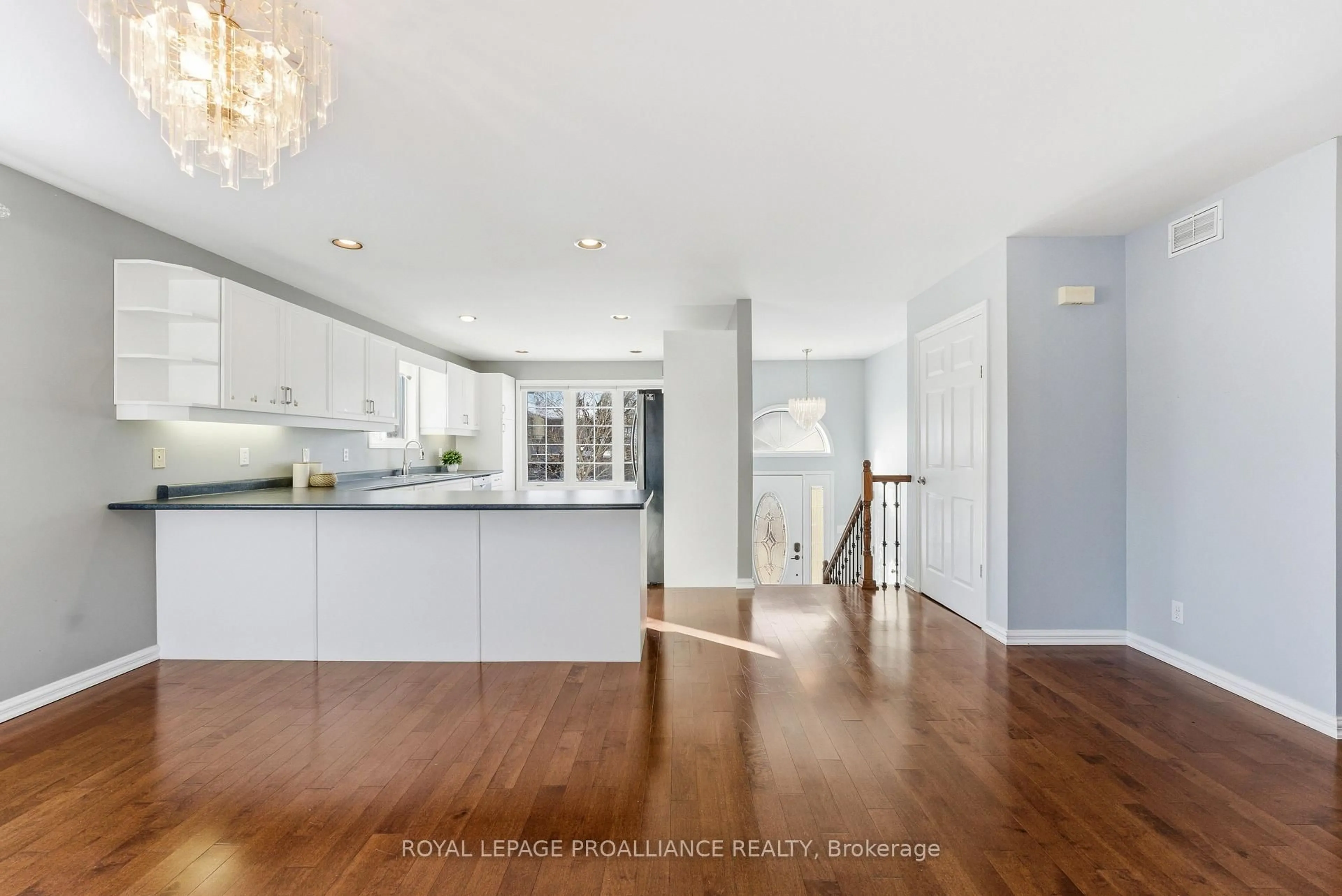 Open concept kitchen, wood/laminate floor for 253 Herchimer Ave, Belleville Ontario K8N 4H1