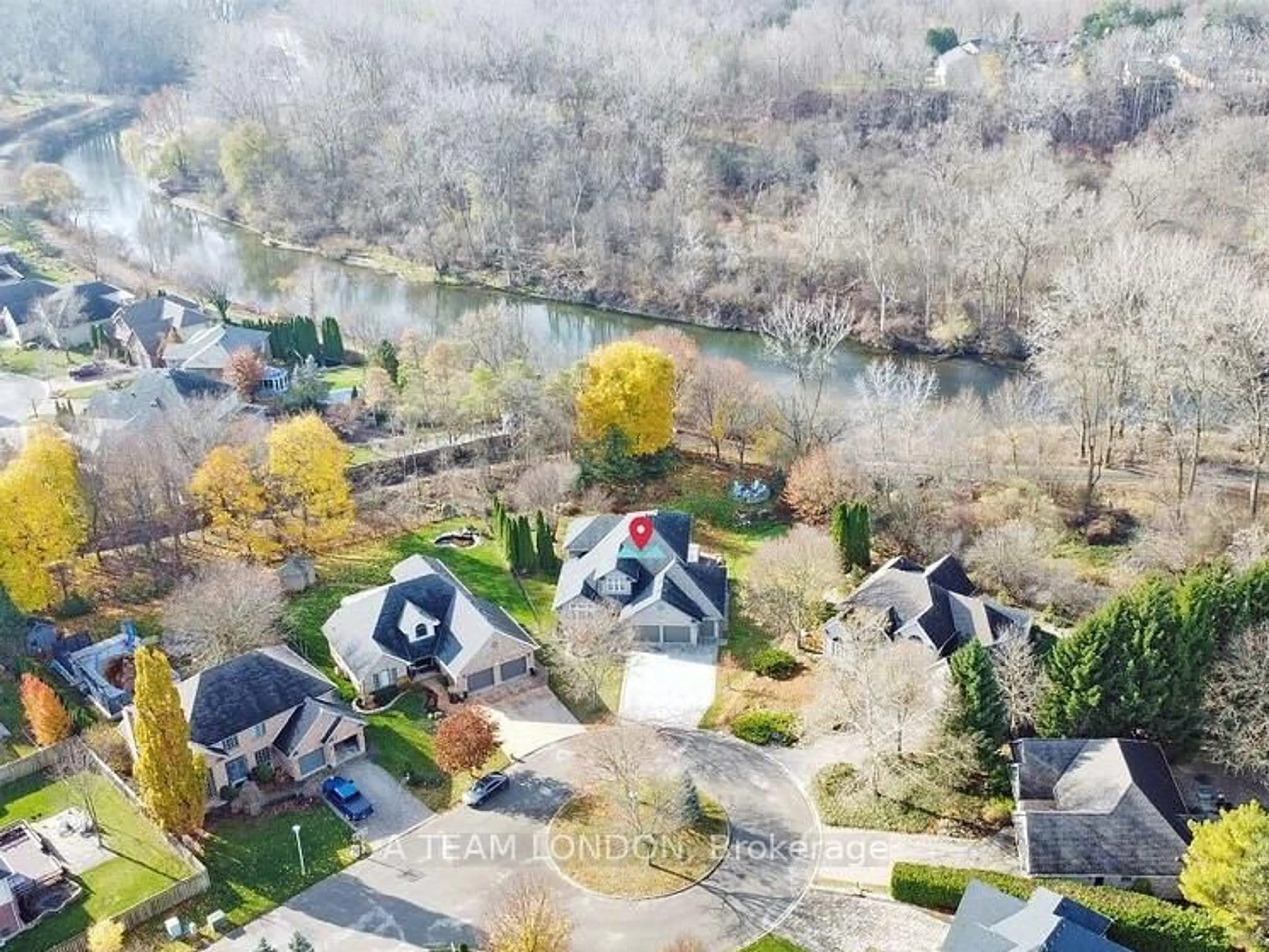 A pic from outside/outdoor area/front of a property/back of a property/a pic from drone, water/lake/river/ocean view for 15 Bayside Crt, London East Ontario N5Y 5M6