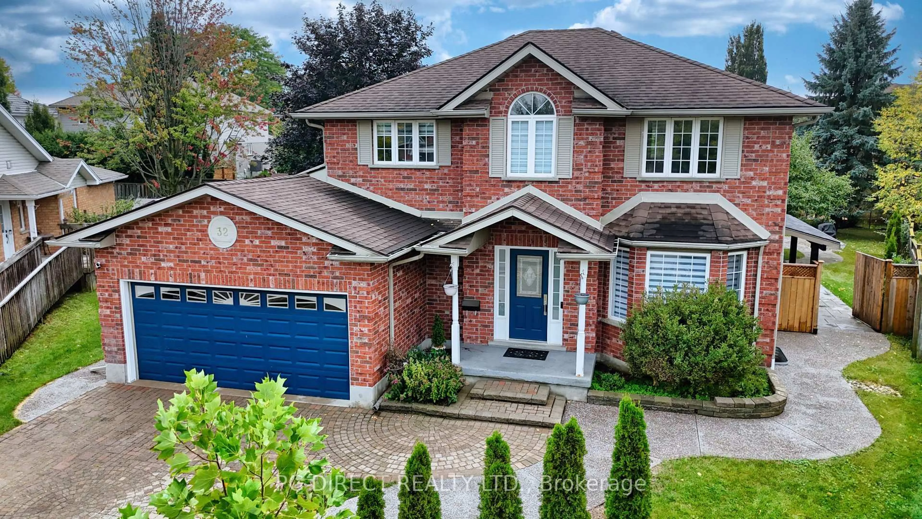 Home with brick exterior material, street for 32 Elsley Crt, Guelph Ontario N1C 1C8