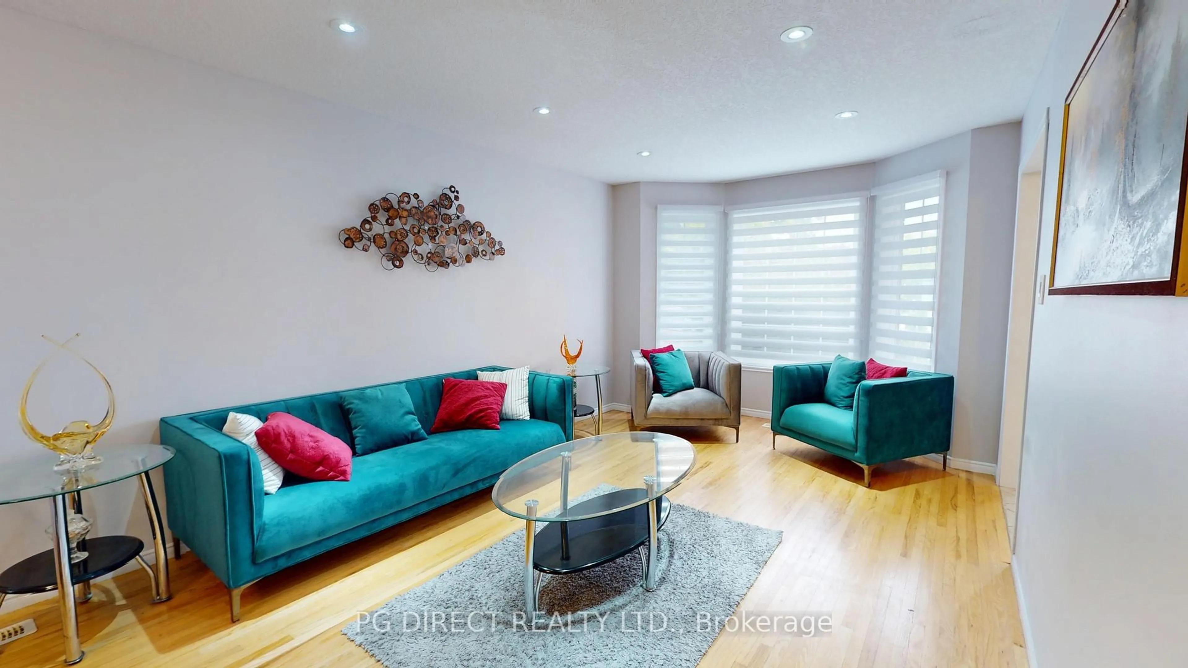 Living room with furniture, wood/laminate floor for 32 Elsley Crt, Guelph Ontario N1C 1C8