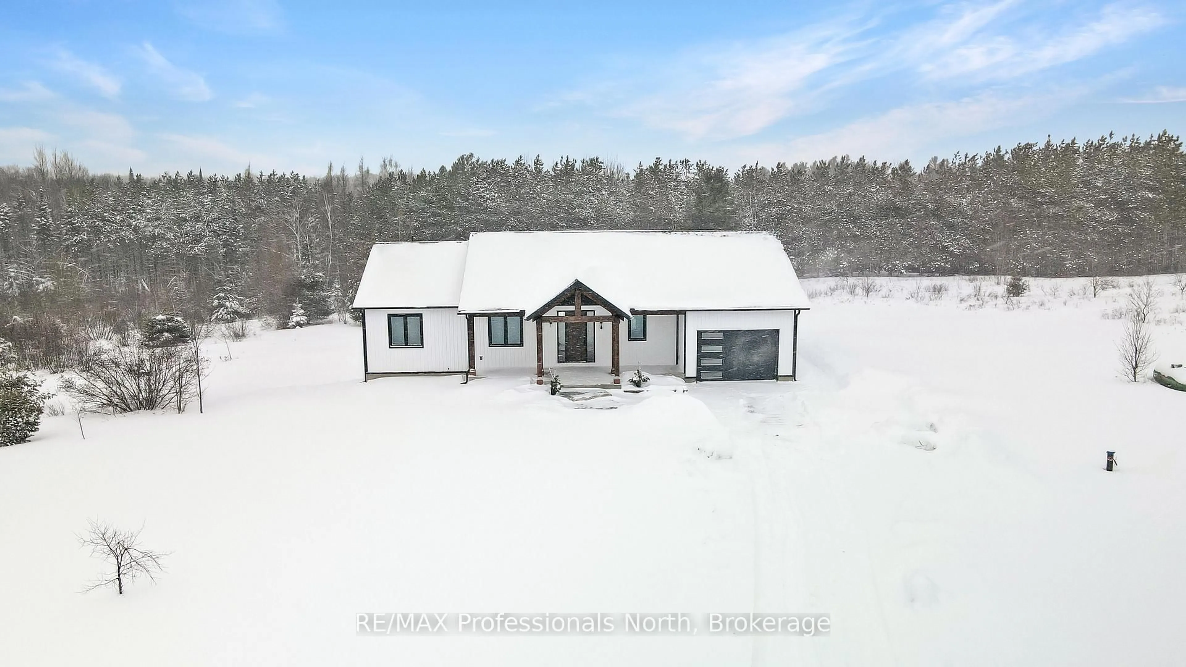 A pic from outside/outdoor area/front of a property/back of a property/a pic from drone, building for 1058 Piper Glen Rd, Minden Hills Ontario K0M 2K0