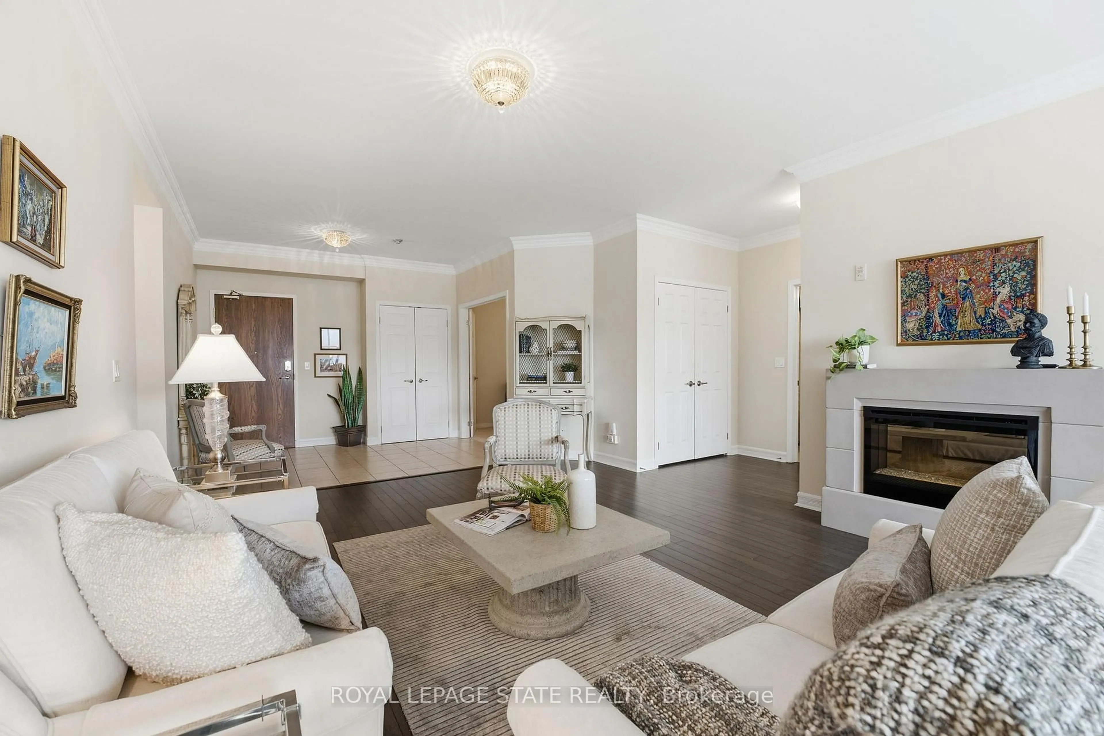 Living room with furniture, unknown for 3000 Creekside Dr #706, Hamilton Ontario L9H 7S8